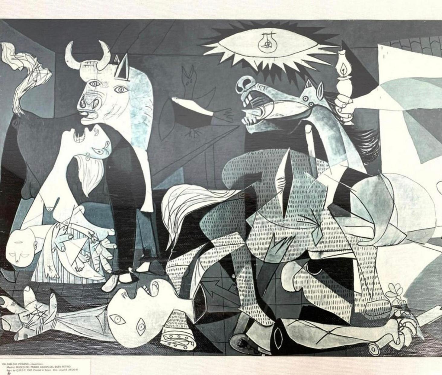 Framed Pablo Picasso print of “Guernica” in great shape. Printed in 1987. Ready to hang. Original black frame presents well. Measures: 17.5” tall and 33” wide and 1” deep. The dimensions of the printed area in its current presentation are 26.5” wide