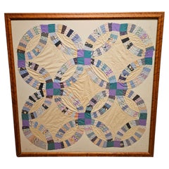 Framed Pair of Early 20th Century American Double Wedding Ring Quilts, 39" x 39"