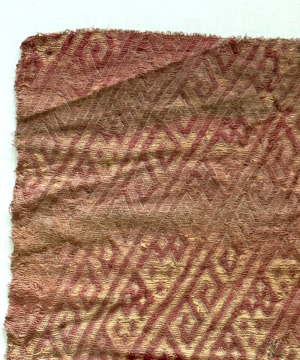 Fragmento enmarcado de textil fino precolombino de la cultura Chancay Peruano en venta