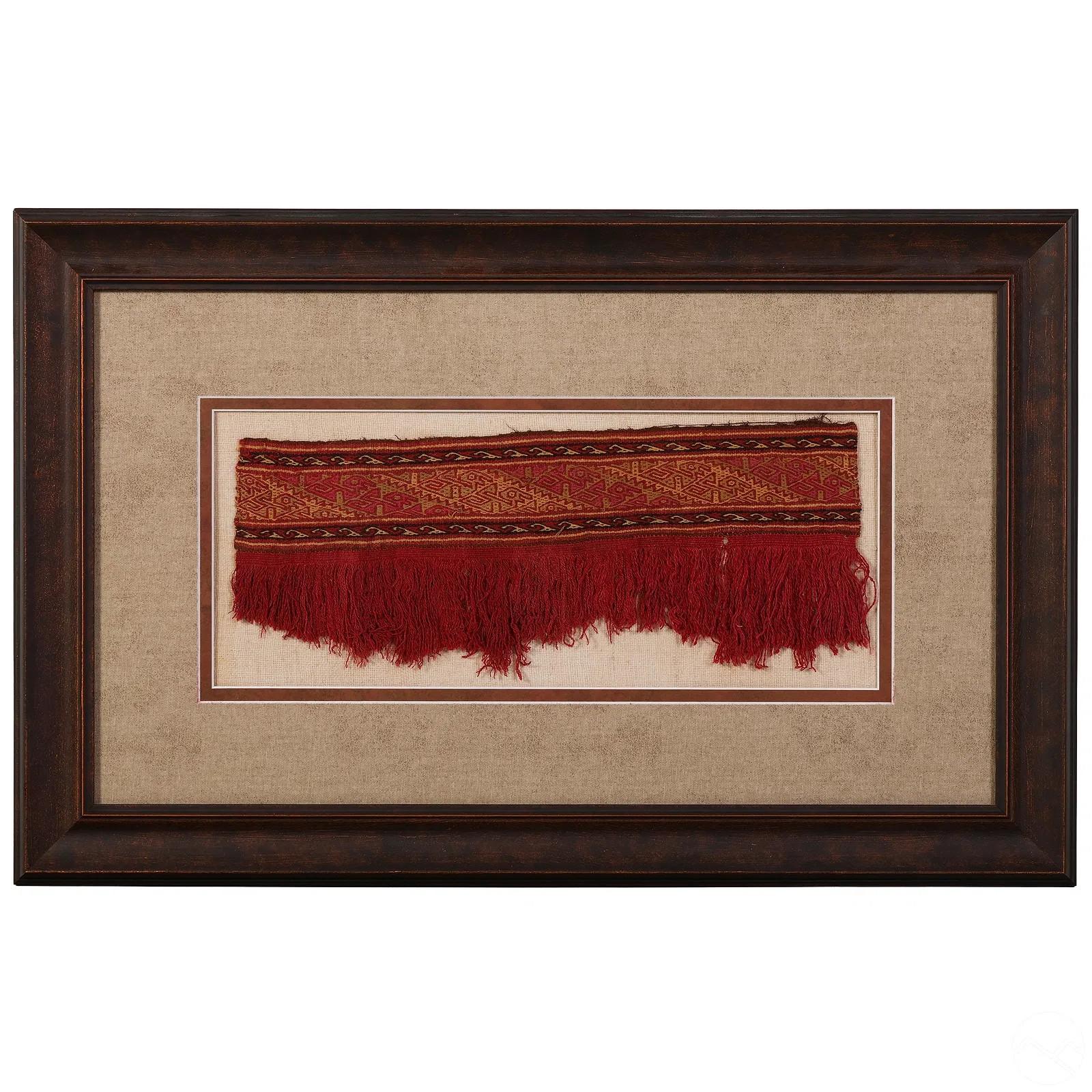 A fragment of antique pre-Columbia textile panel from Chimu or Chancay culture located in Central and Northern Coast of nowadays Peru. Chancay culture thrived in the late Intermediate period/ late Horizon circa 1000-1470 CE until it was incorporated