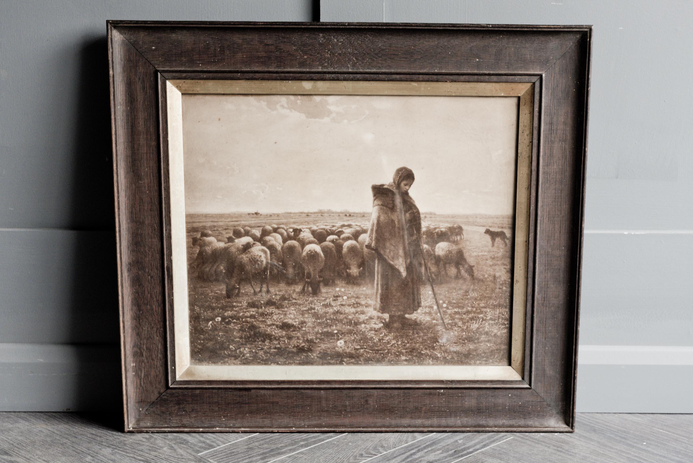 Framed victorian print of workers in field.