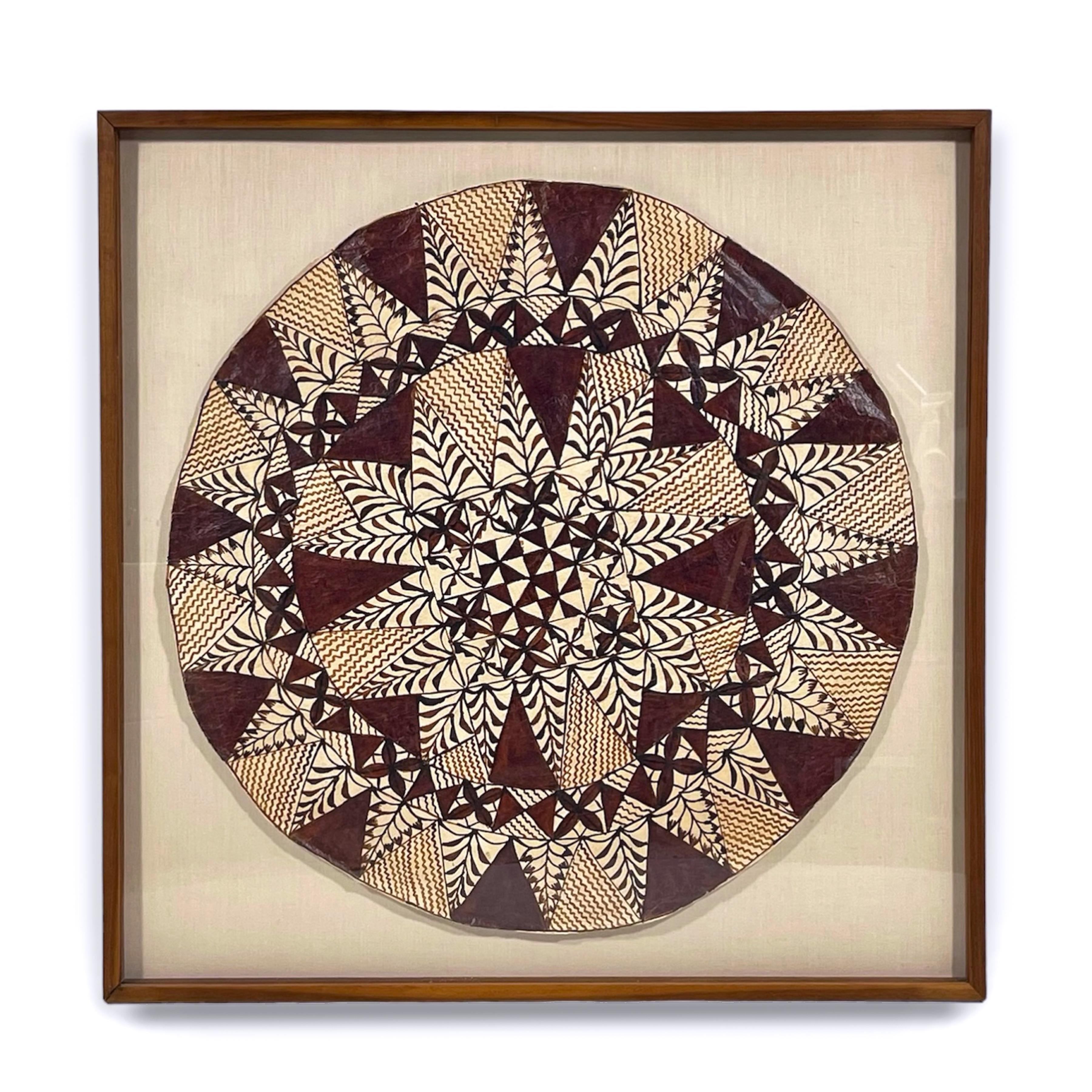 This striking piece of Samoan Tapa cloth speaks to the history of the South Pacific islanders who have made these beautiful barkcloth artworks for generations and with it's repeating patterns and shapes it also functions like a contemporary