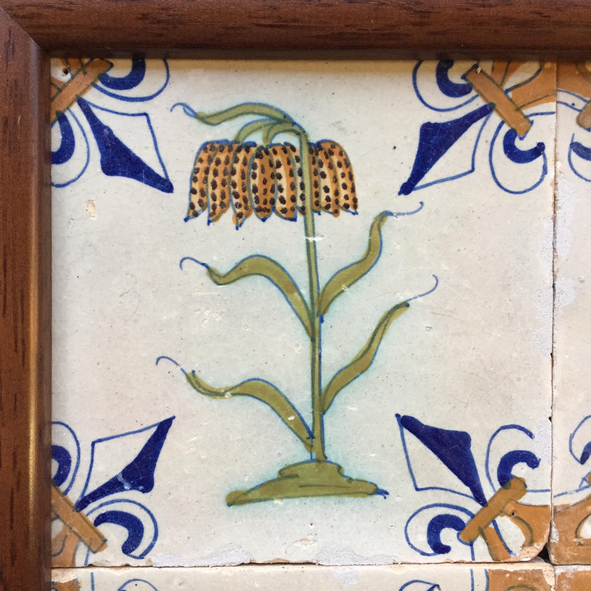 A set of 4 polychrome Dutch Delft tiles with flowers. 
Made in The Netherlands.
Circa 1620 - 1640.

A fine set of four tiles with flowers of one firing.
A Fritillary, Imperial crown flower, and more wonderful flowers.
On the tile with the