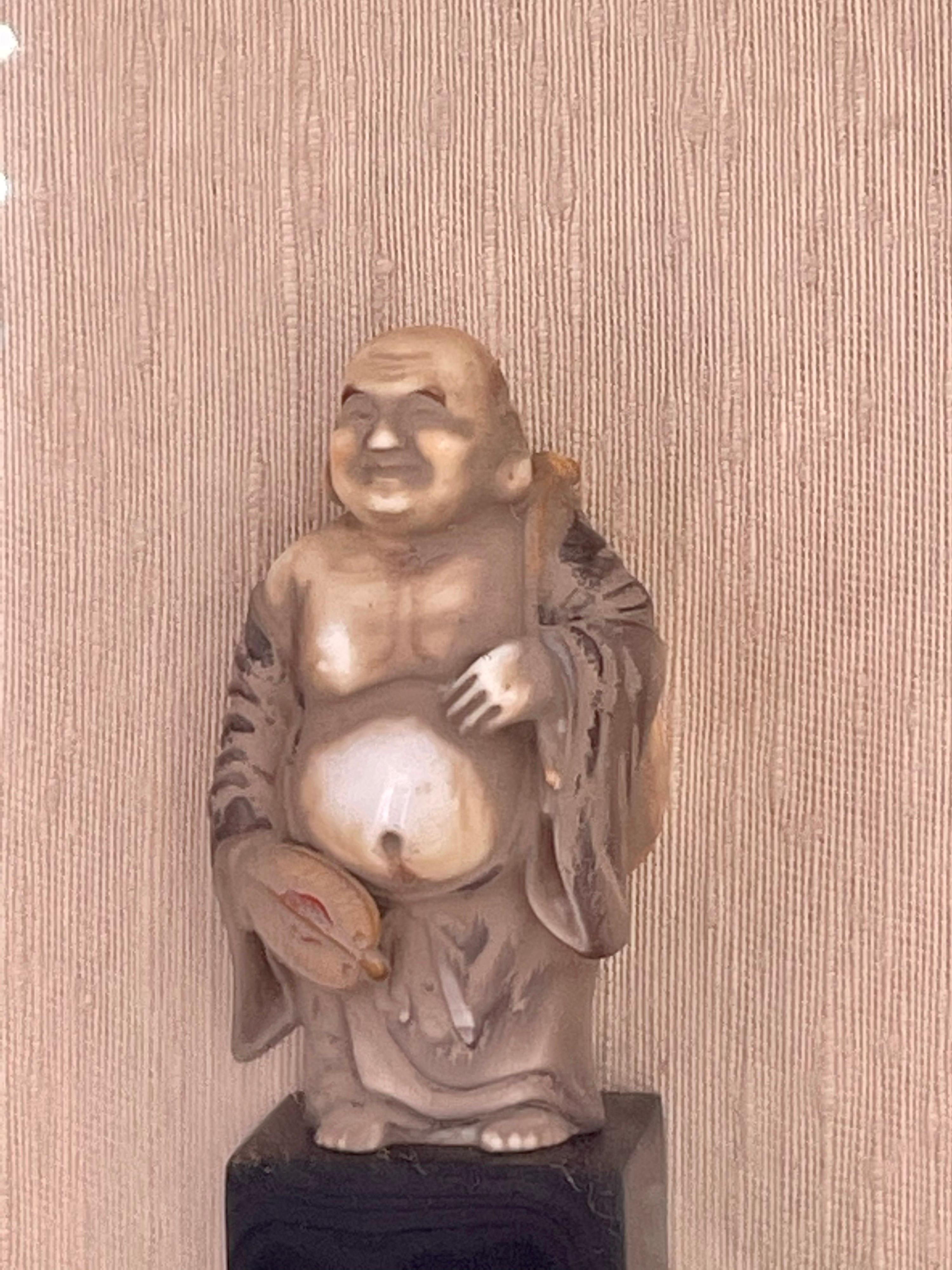 Nicely framed vintage Buddha Figurine, circa 1970s.