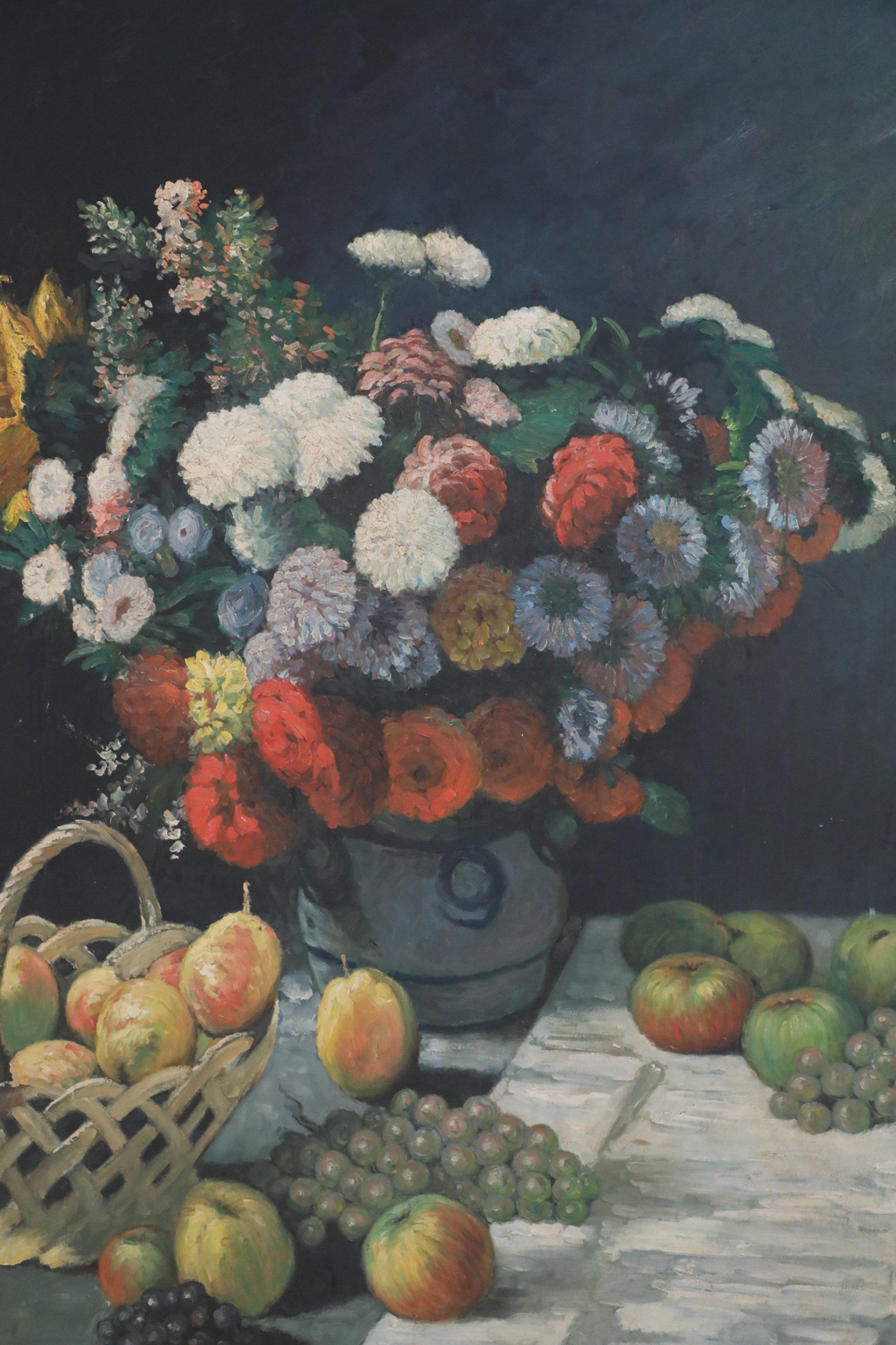 Mid-Century oil still life painting of a vase filled with assorted flowers next to a basket full of fruit on a table covered in fruit and grapes in a rectangular carved giltwood frame.
 