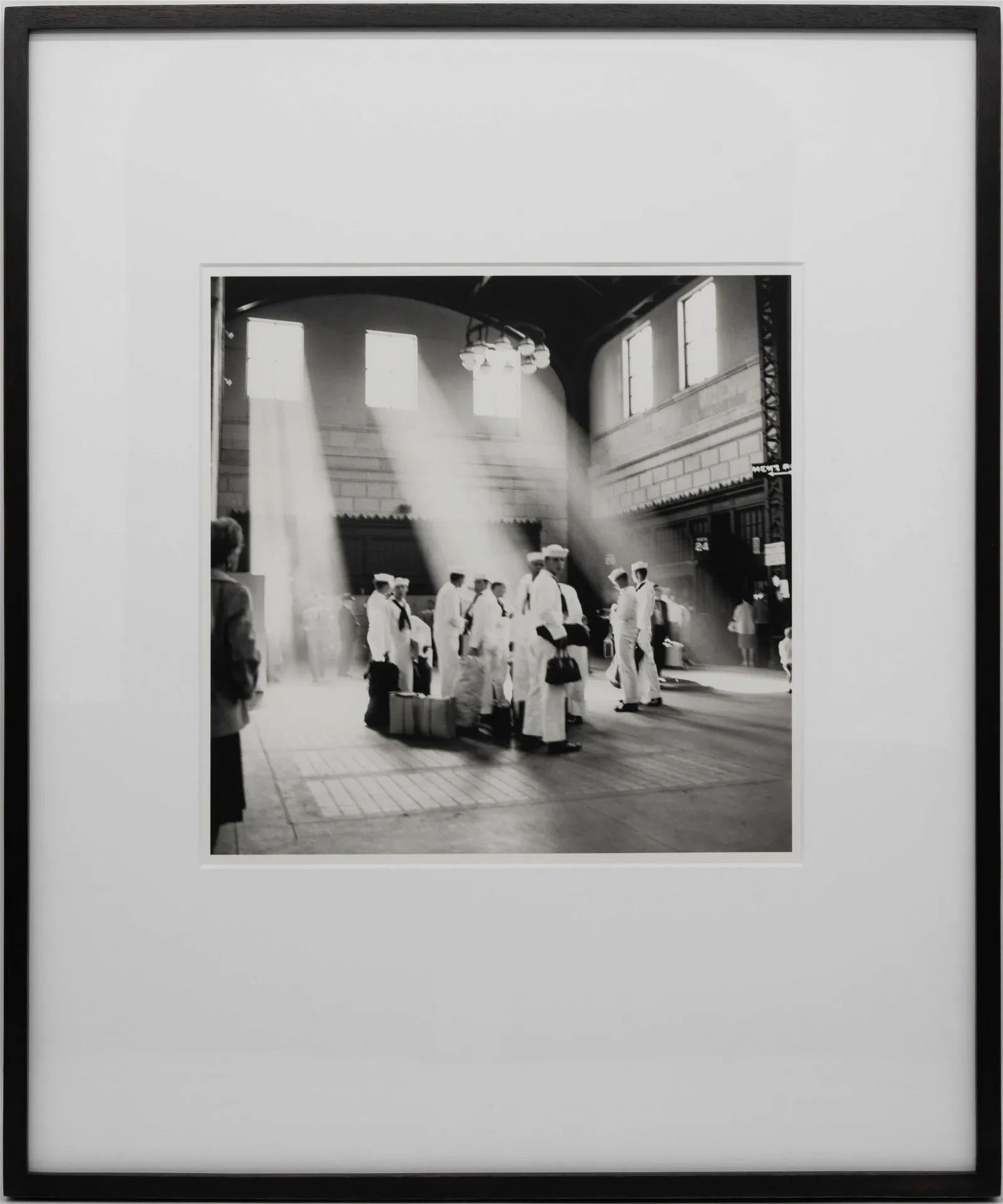 A framed black and white street photograph by Vivian Maier (American, 1926-2009), 