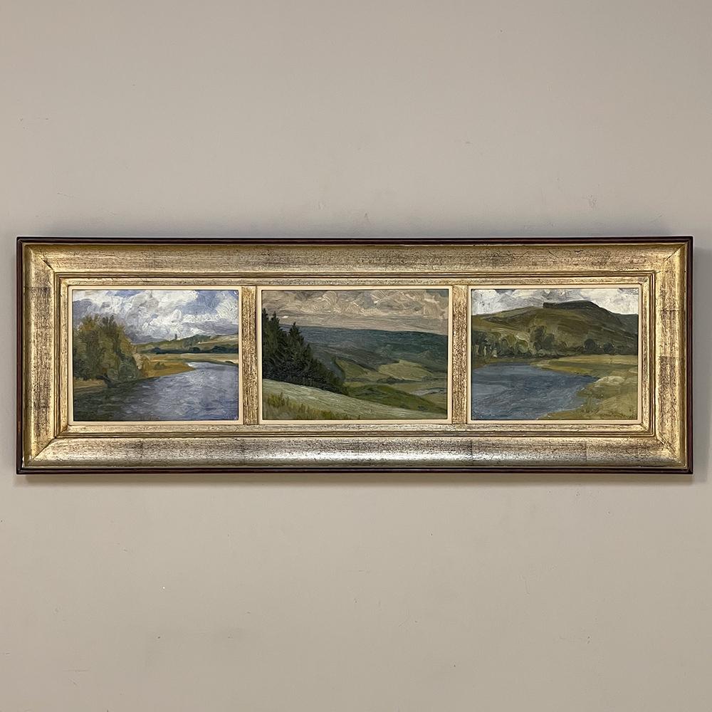Framed Triptych Oil Painting on Board is signed by the artist, and features three amazing landscapes creating a panorama of beauty! Framed together as one, the scenes depict two small rivers snaking through lush, hilly terrain, and a third an