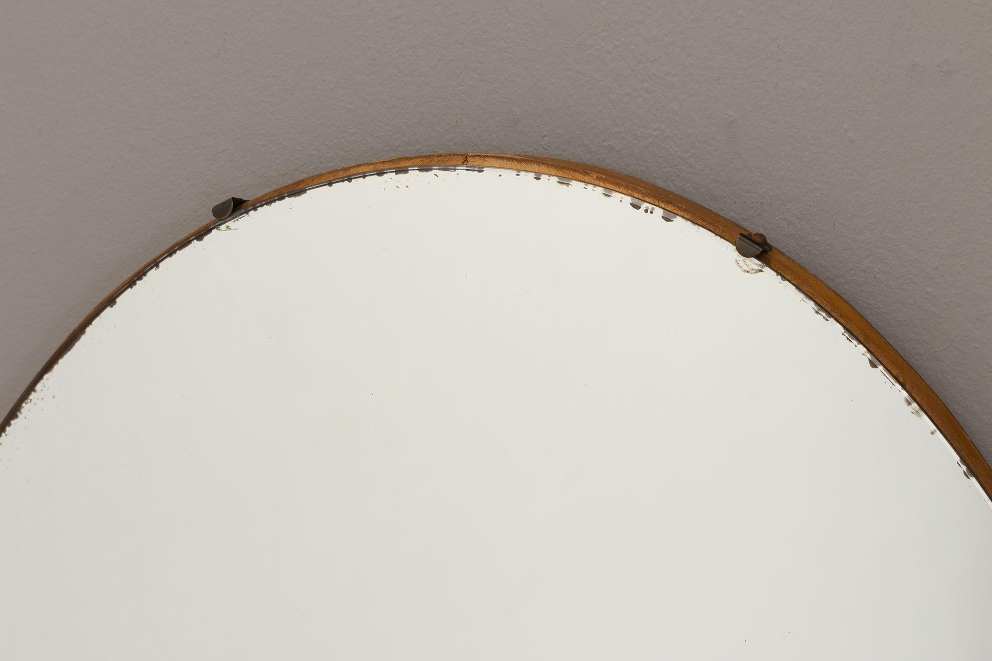 Large frameless oval mirror. U.K circa 1950.
H 107cm x W 61cm x D 4cm