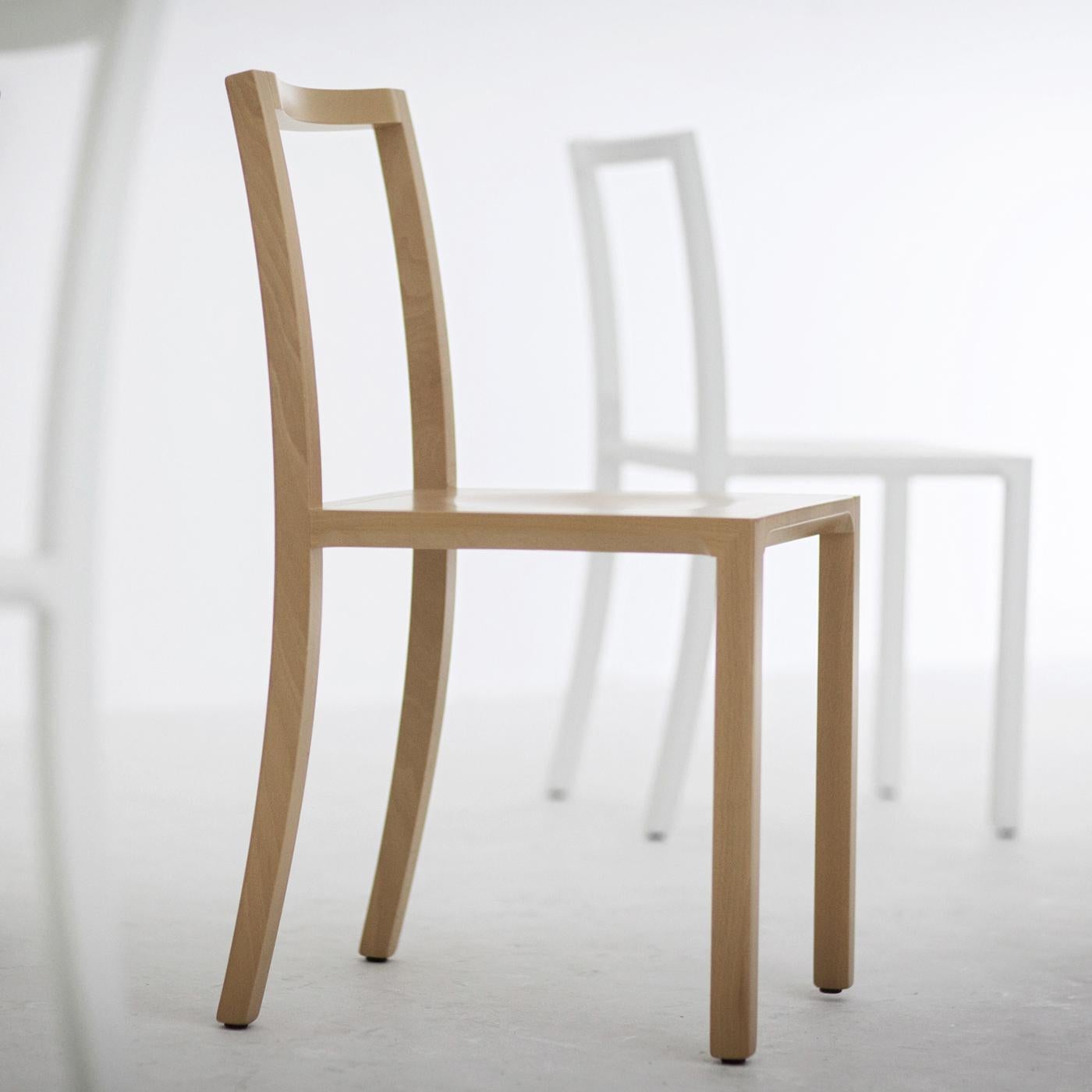 This captivating set of two chairs was designed by Steffen Kehrle for the Framework collection, which takes inspiration from the concept of customization of various clean and essential types of designs to comply with specific needs. Each chair of