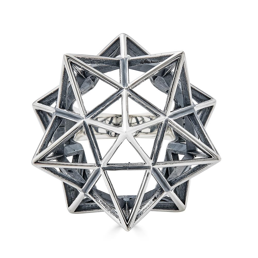 This iconic John Brevard sacred geometry statement ring is created in sterling silver.

This piece was designed to evoke personal power. 

John Brevard applies his background in architecture and multidisciplinary arts to create ethereal designs that