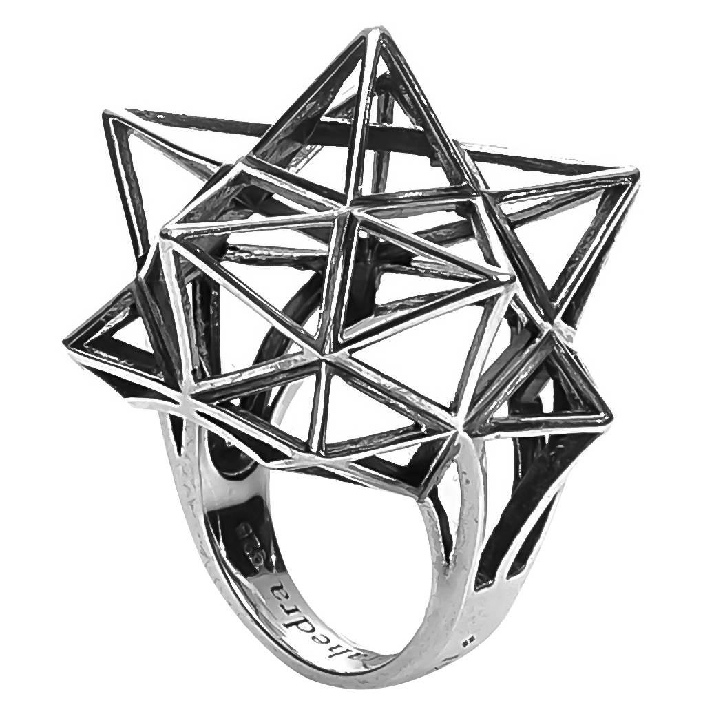 John Brevard sacred geometry statement ring in sterling silver.

This piece was designed to evoke personal power. 

John Brevard applies his background in architecture and multidisciplinary arts to create ethereal designs that are not only visually