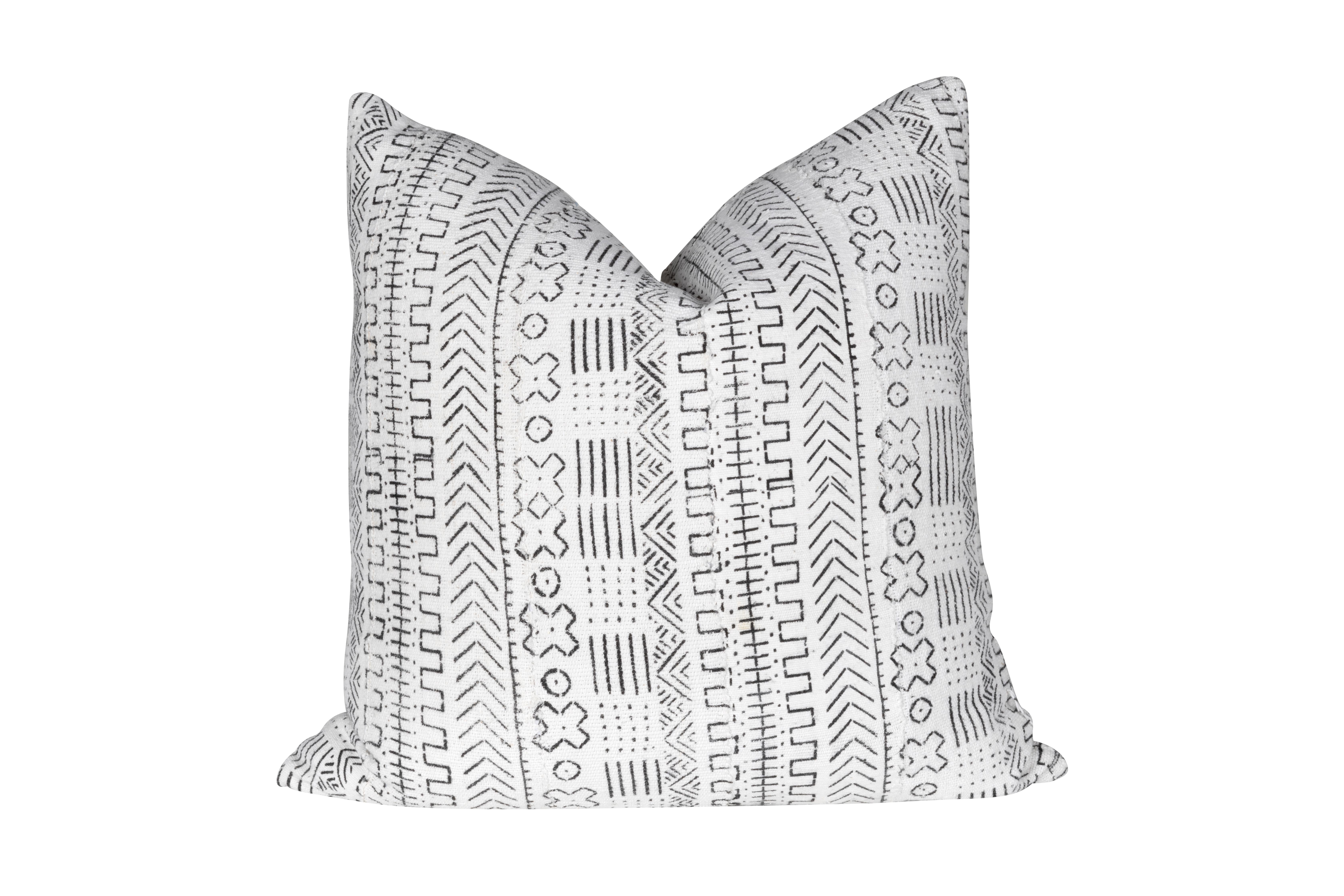This pillow is the perfect accent to any room. The black and white geometric print paired with sturdy fabric and down fill is ultra comfortable . Add a splash of personality to any space with this original pillow from Frameworks. This down filled