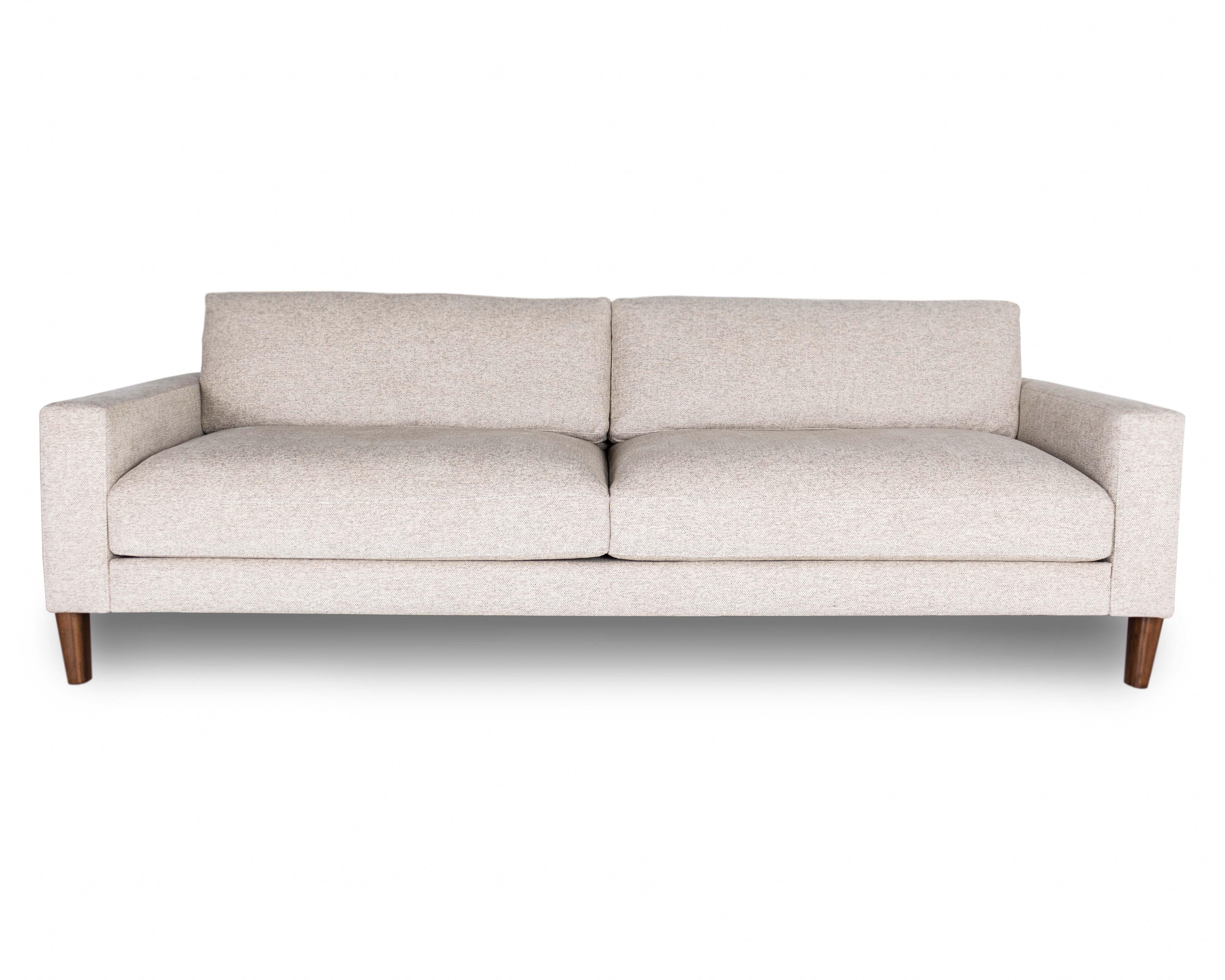 The Alpine high leg sofa and sectional take inspiration from inspirational architecturally constructed wooden structures of Texas. The Alpine leg has contouring angles that start at the base, grow up, and taper nicely into the outside, finishing