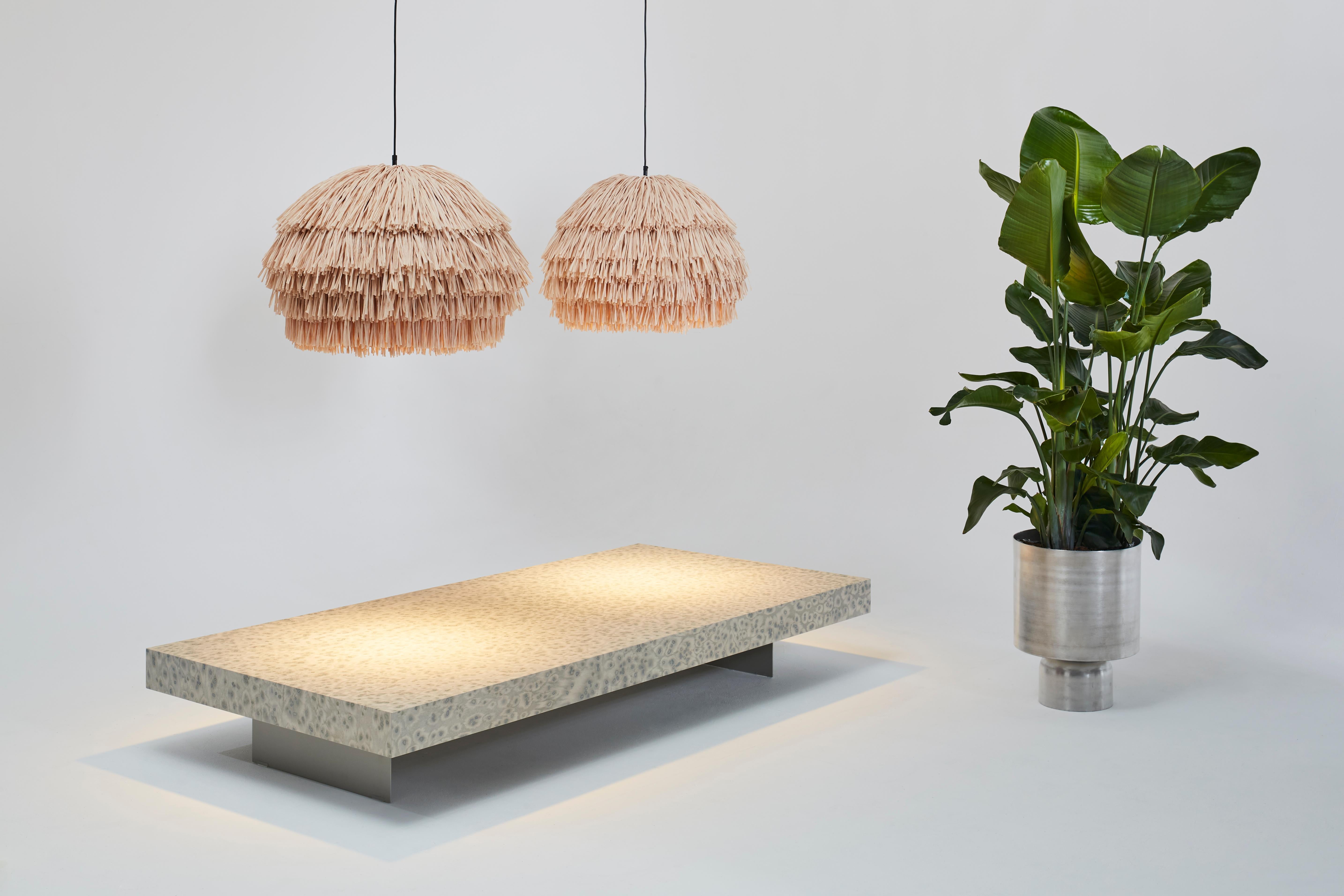 With their bulky silhouette and rustling fringes, the FRAN lights are reminiscent of a piñata. While their cable becomes the suspension string, their fluttering body is made of high-quality rayon, a viscose fiber based on cellulose. The fringe