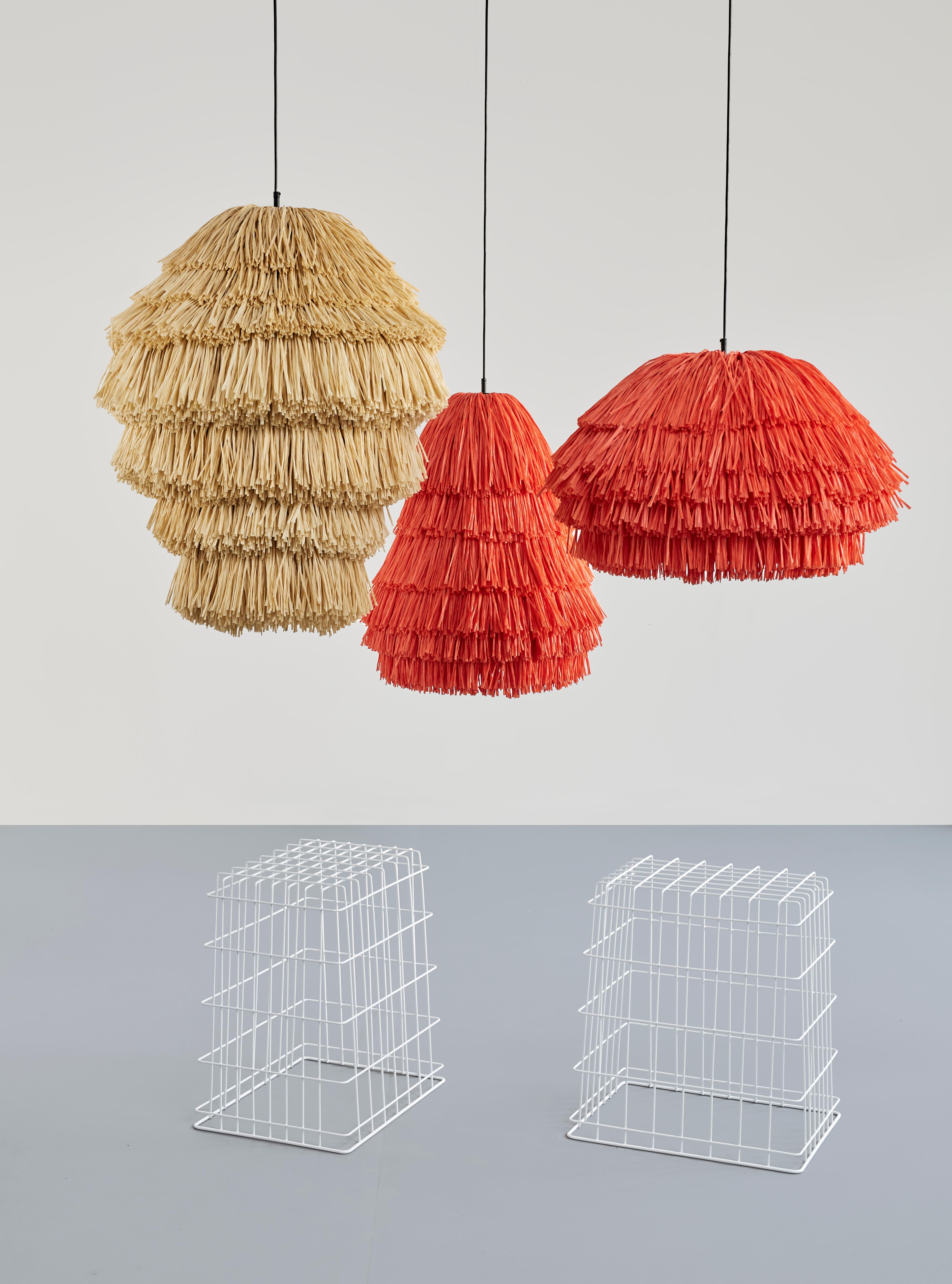 With their bulky silhouette and rustling fringes, the FRAN lights are reminiscent of a piñata. While their cable becomes the suspension string, their fluttering body is made of high-quality rayon, a viscose fiber based on cellulose. The fringe