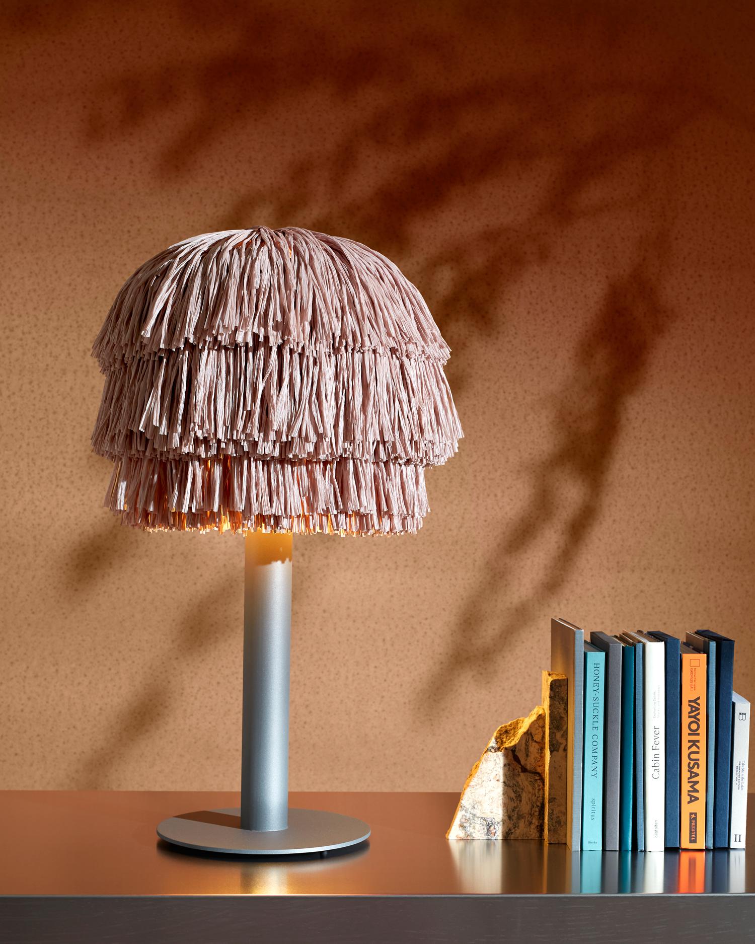 With their bulky silhouette and rustling fringes, the FRAN lights are reminiscent of a piñata. While their cable becomes the suspension string, their fluttering body is made of high-quality rayon, a viscose fiber based on cellulose. The fringe