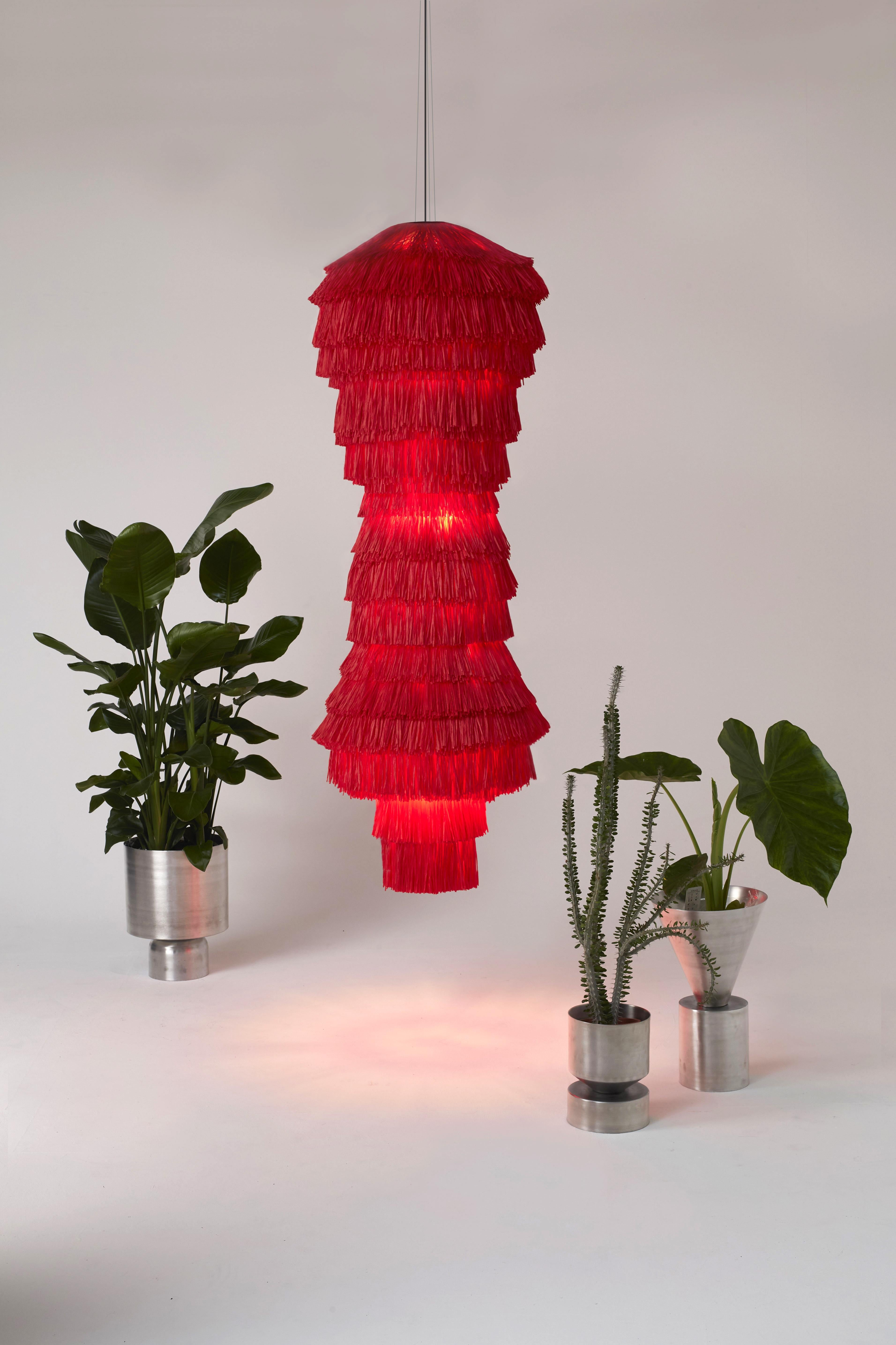 Fran tower lamp by Llot Llov
Handcrafted light object
Dimensions: Ø 62 cm x H: 190 cm
Materials: raffia fringes

The latest addition to the FRAN family is the FRAN TOWER. The eye-catching and elaborately handcrafted light object consists of 15