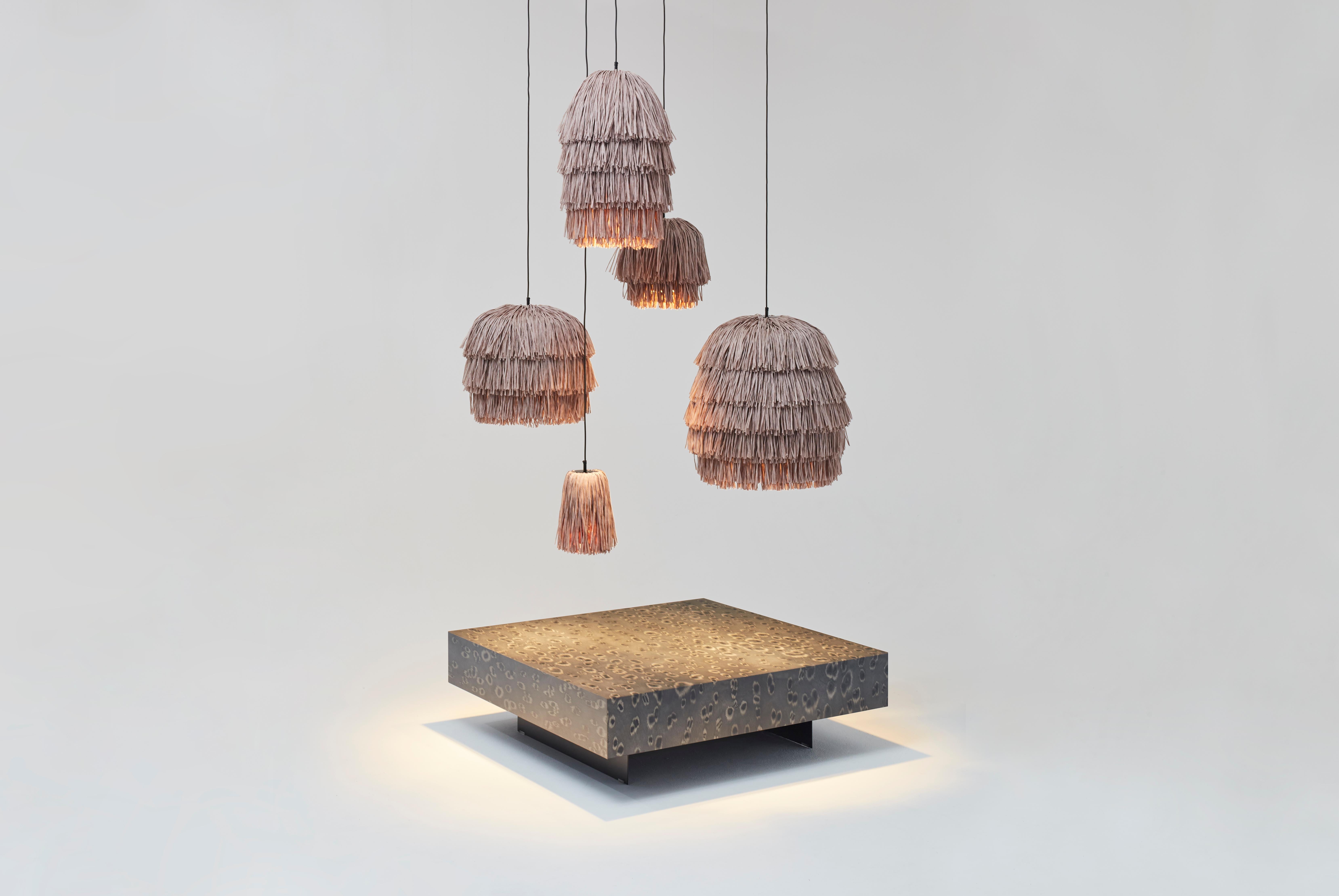 With their bulky silhouette and rustling fringes, the FRAN lights are reminiscent of a piñata. While their cable becomes the suspension string, their fluttering body is made of high-quality rayon, a viscose fiber based on cellulose. The fringe