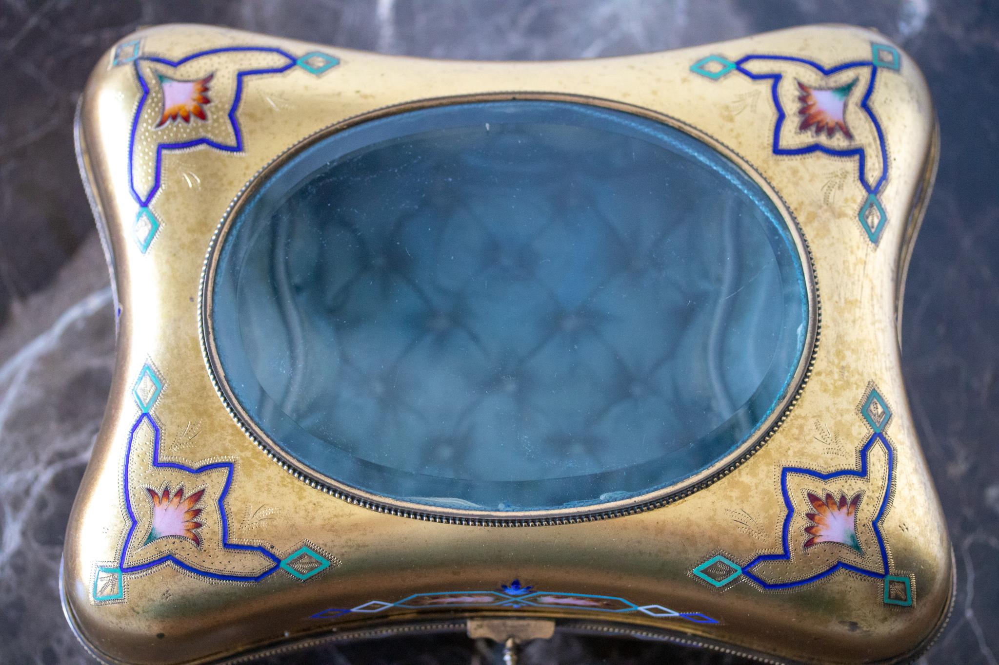 Important and rare French cloisonne box for jewelry.

Beautiful piece made in Paris France at the end of the Napoleon III, during the third empire period, circa 1870. Carefully crafted in bronze and ormolu with rich 24 karats of gilding and