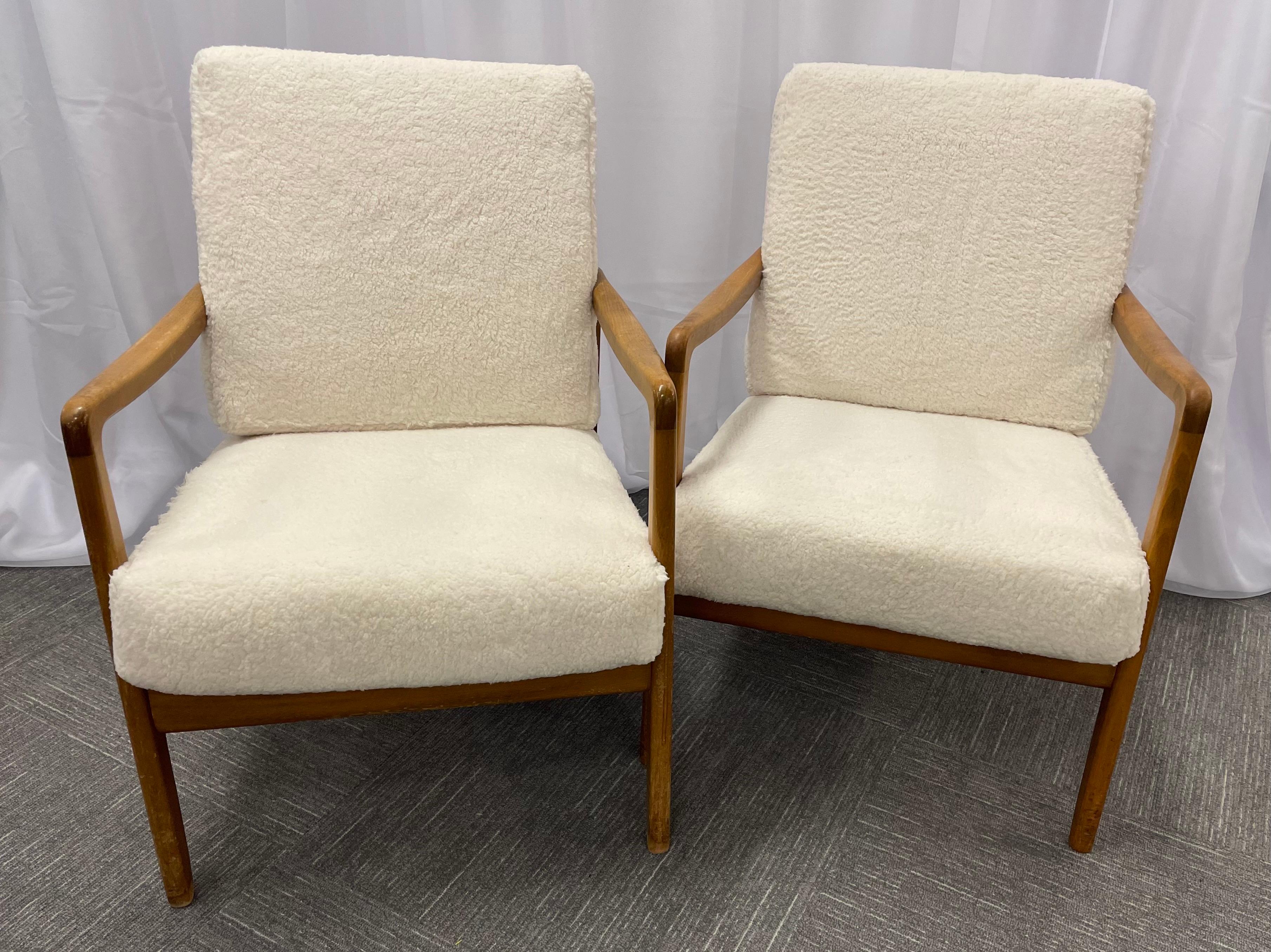 Pair of France & Daverkosen Teak Armchairs from Mid-Century Modern era. If sleek and stylish are what you are seeking look no more. This finely constructed branded pair of lounge chairs (Backrest bears label 
