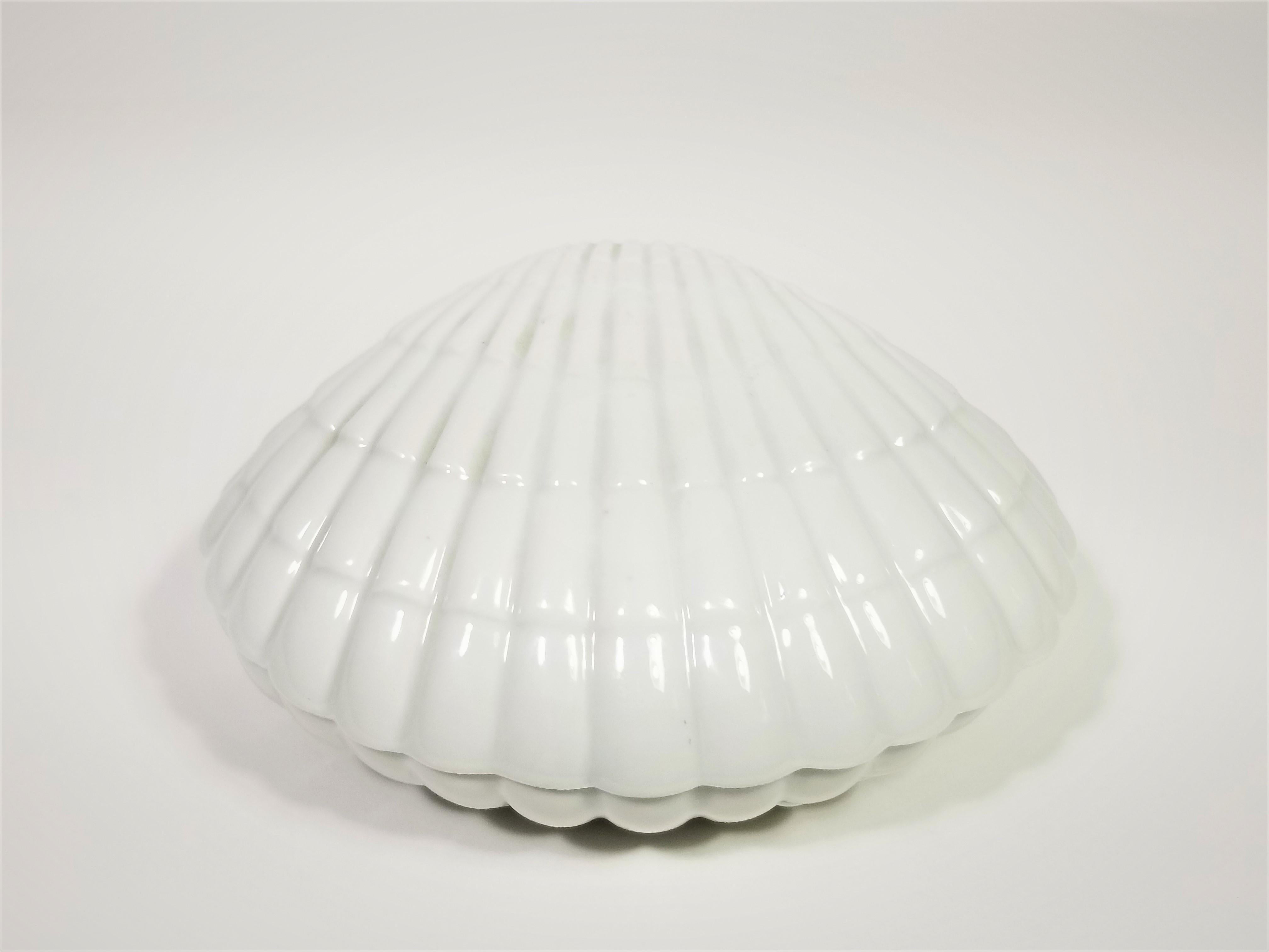 French midcentury decorative white porcelain ceramic clam or shell for vanity, trinkets or decorative
Marked France.