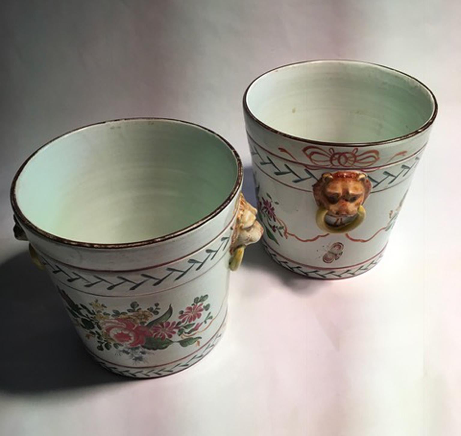 Hand-Crafted France Late 19th Century Pair of Pottery Cache Pots with Flowers and Lions Heads For Sale