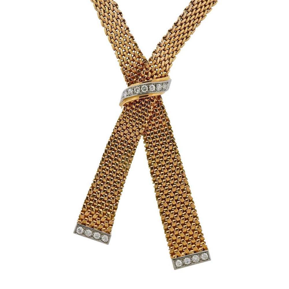 Mid century made in France 18k gold necklace, adorned with approx. 1.10ctw in diamonds The necklace's wearable length is 16