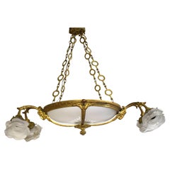 France: Neoclassical chandelier, early 20th century, with gilded bronze and fros