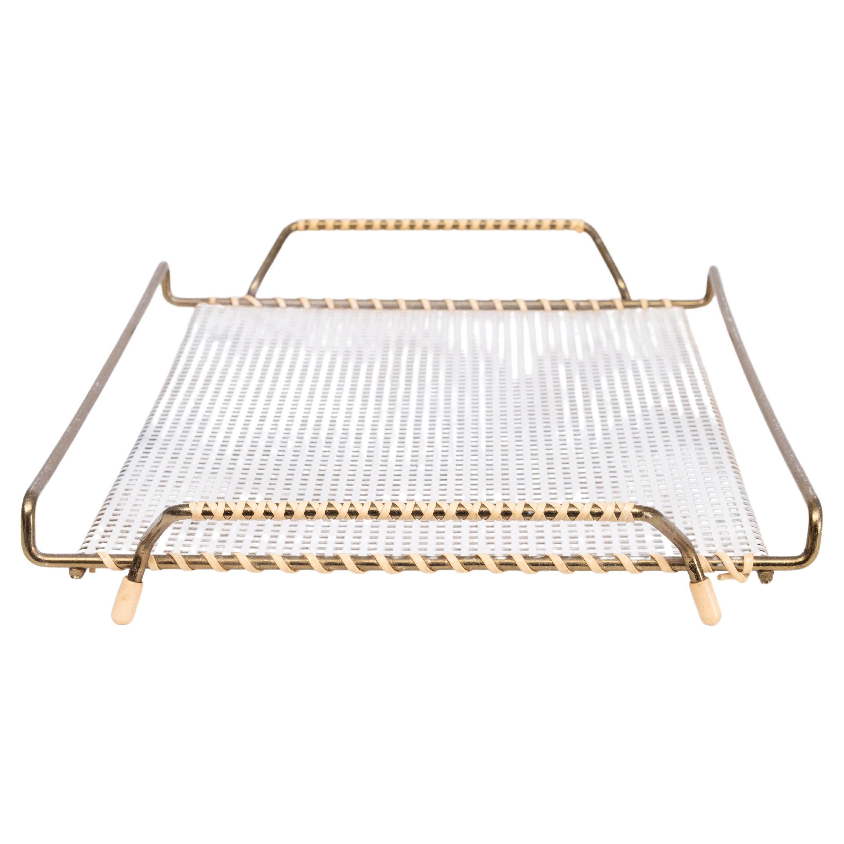 Very nice perforated metal serving tray . Brass frame .
standing on little feet . Still all complete . good condition . 

