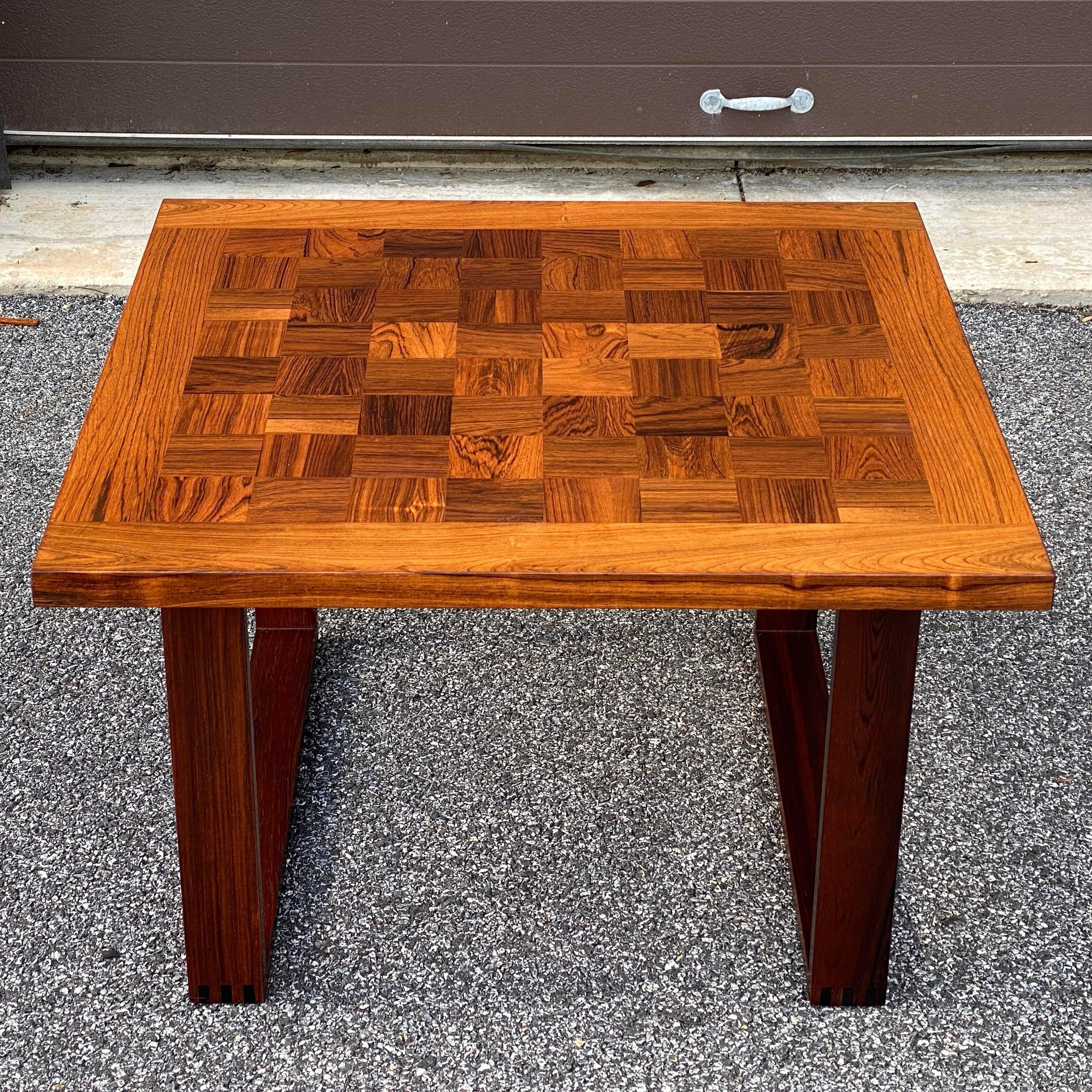 Vintage rosewood coffee table with a chessboard style top designed by Poul Cadovius for France & Son. Marked underneath with 