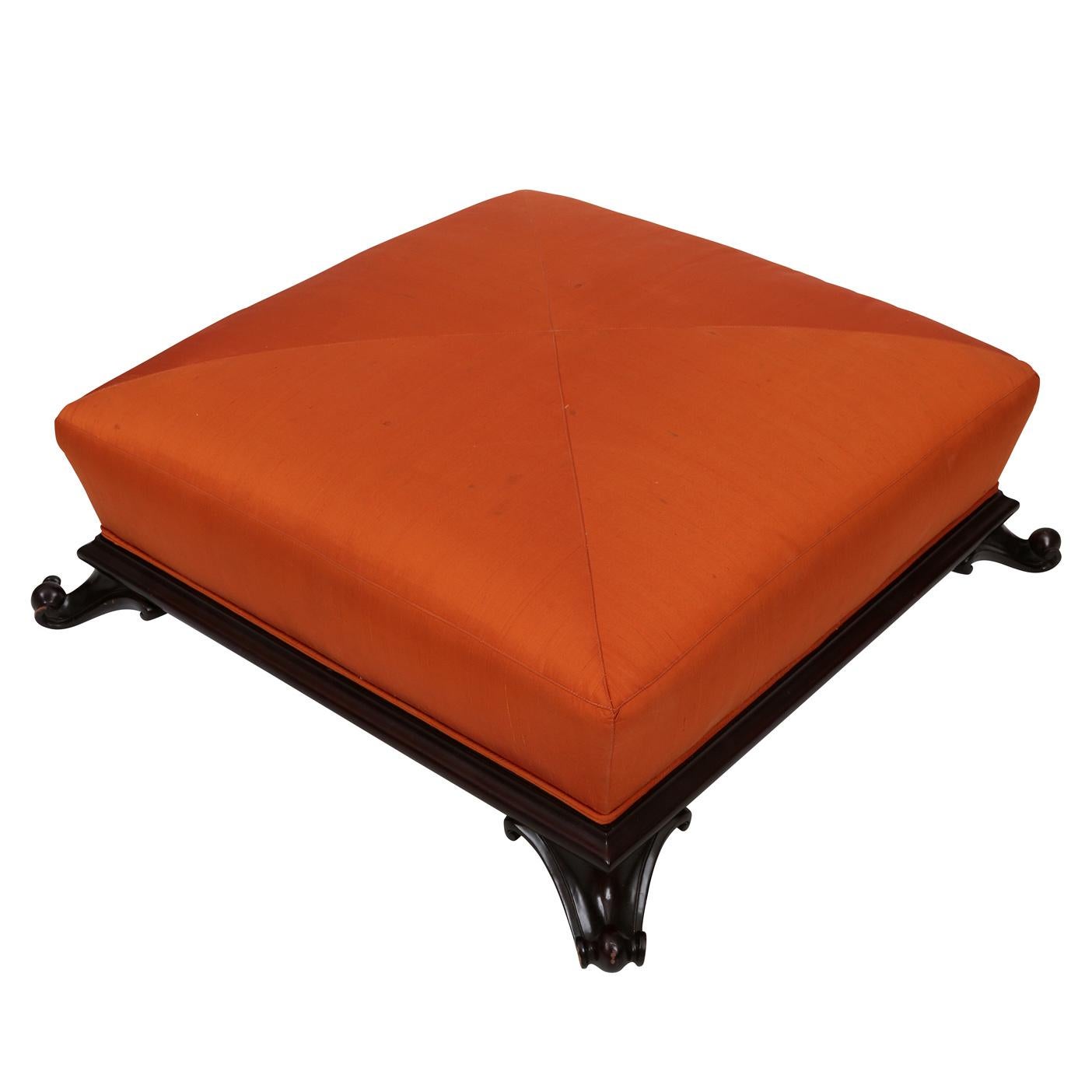 A super chic vintage Frances Elkins footed Turkish ottoman with a gorgeous orange silk upholstery top.