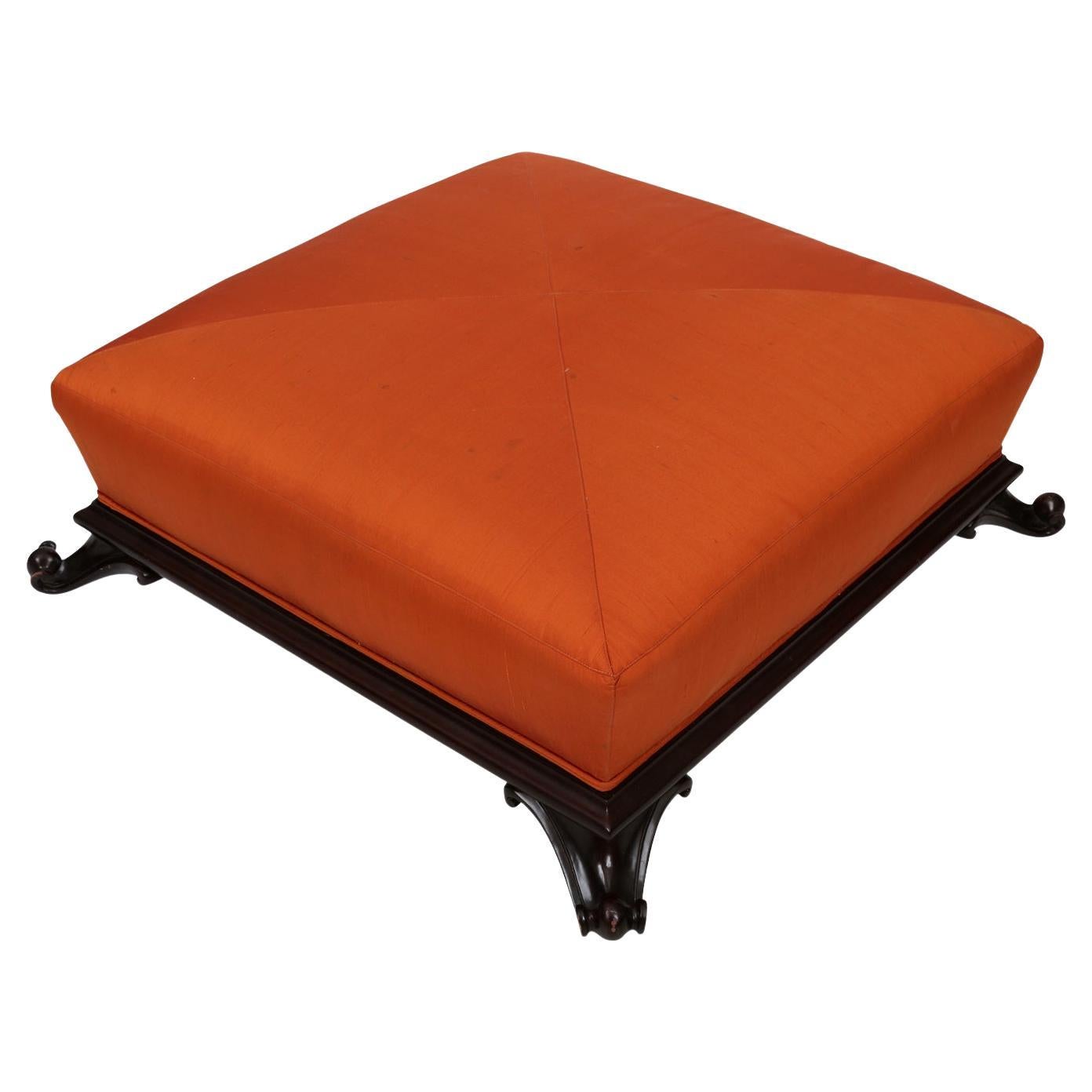 Frances Elkins Footed Turkish Ottoman in Orange Silk Upholstery For Sale