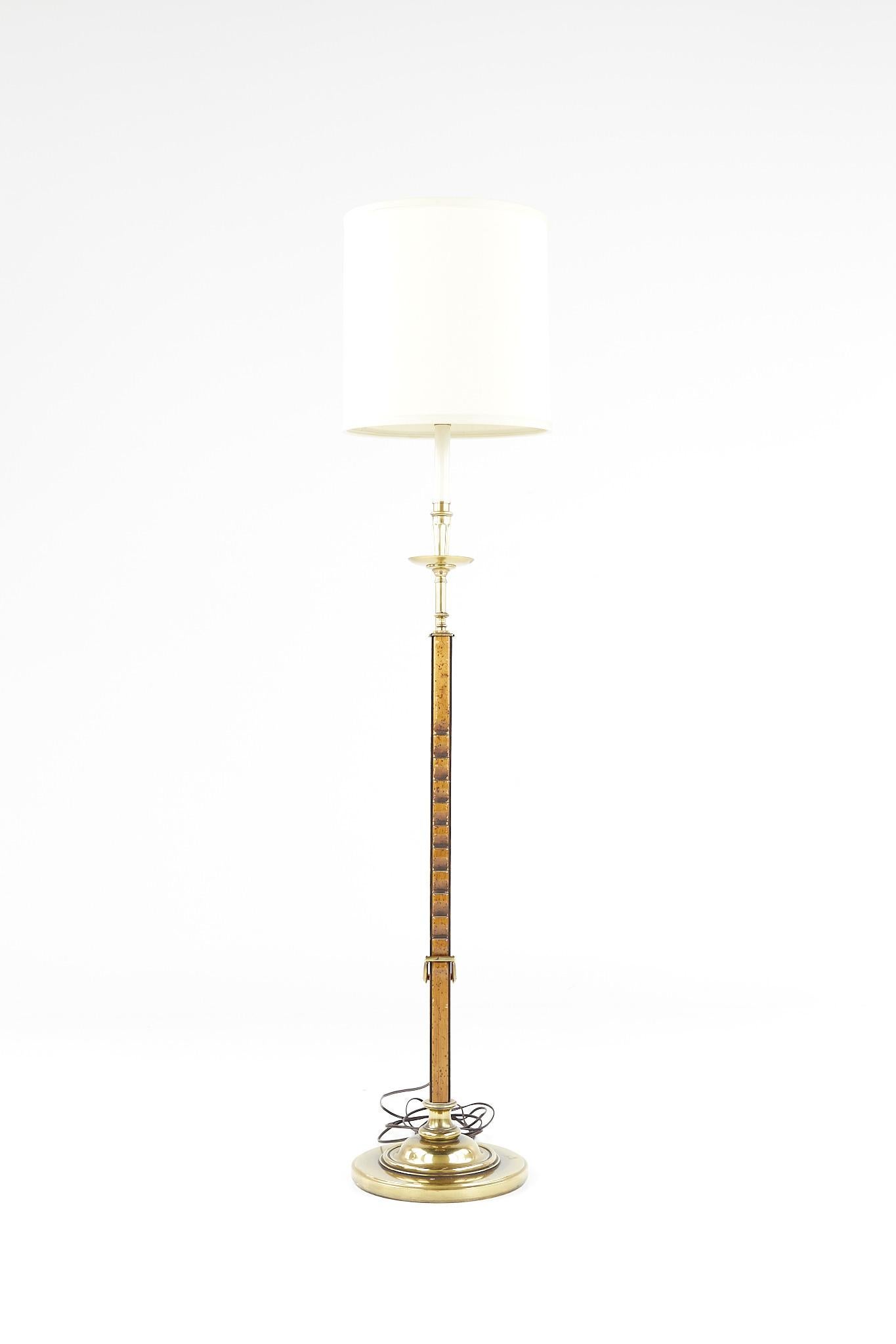 Frances Elkins style mid century brass and burlwood adjustable floor lamp

This lamp measures: 10 wide x 10 deep x 53 inches high, with a maximum height of 66 inches

We take our photos in a controlled lighting studio to show as much detail as