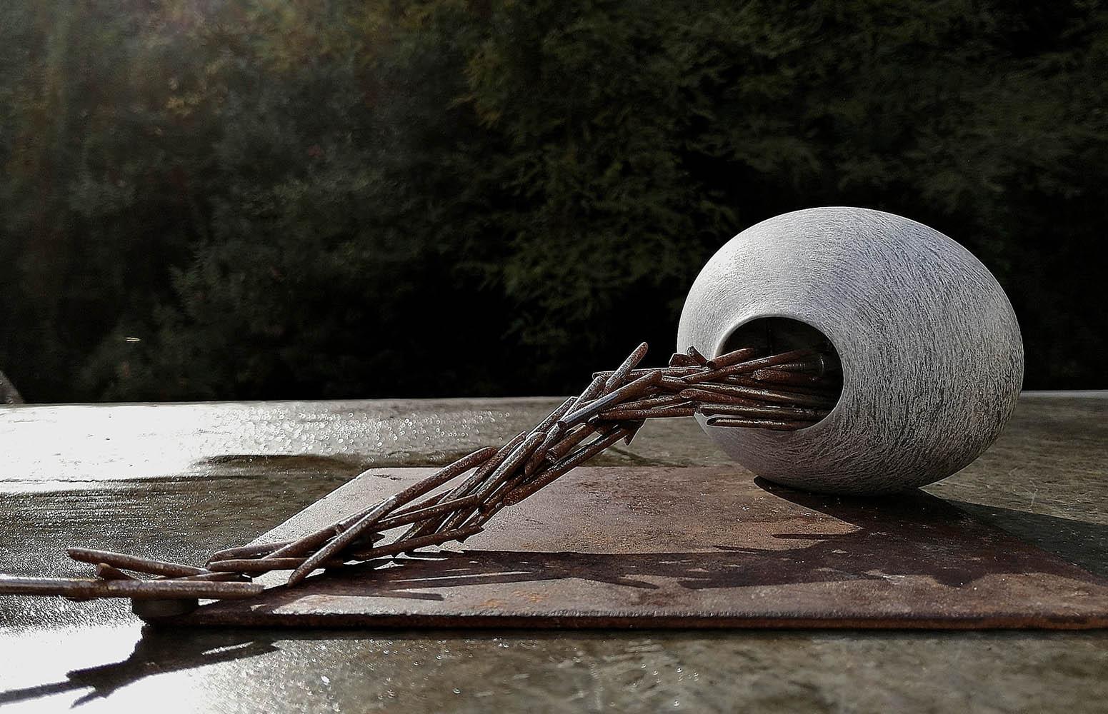 Comfort zone is a unique Bardiglio marble and steel sculpture by contemporary artist Francesca Bernardini. The sculpture is maintained on the iron base with magnets but it is movable, dimensions including iron base are 8 cm × 18 cm × 18 cm (3.1 ×