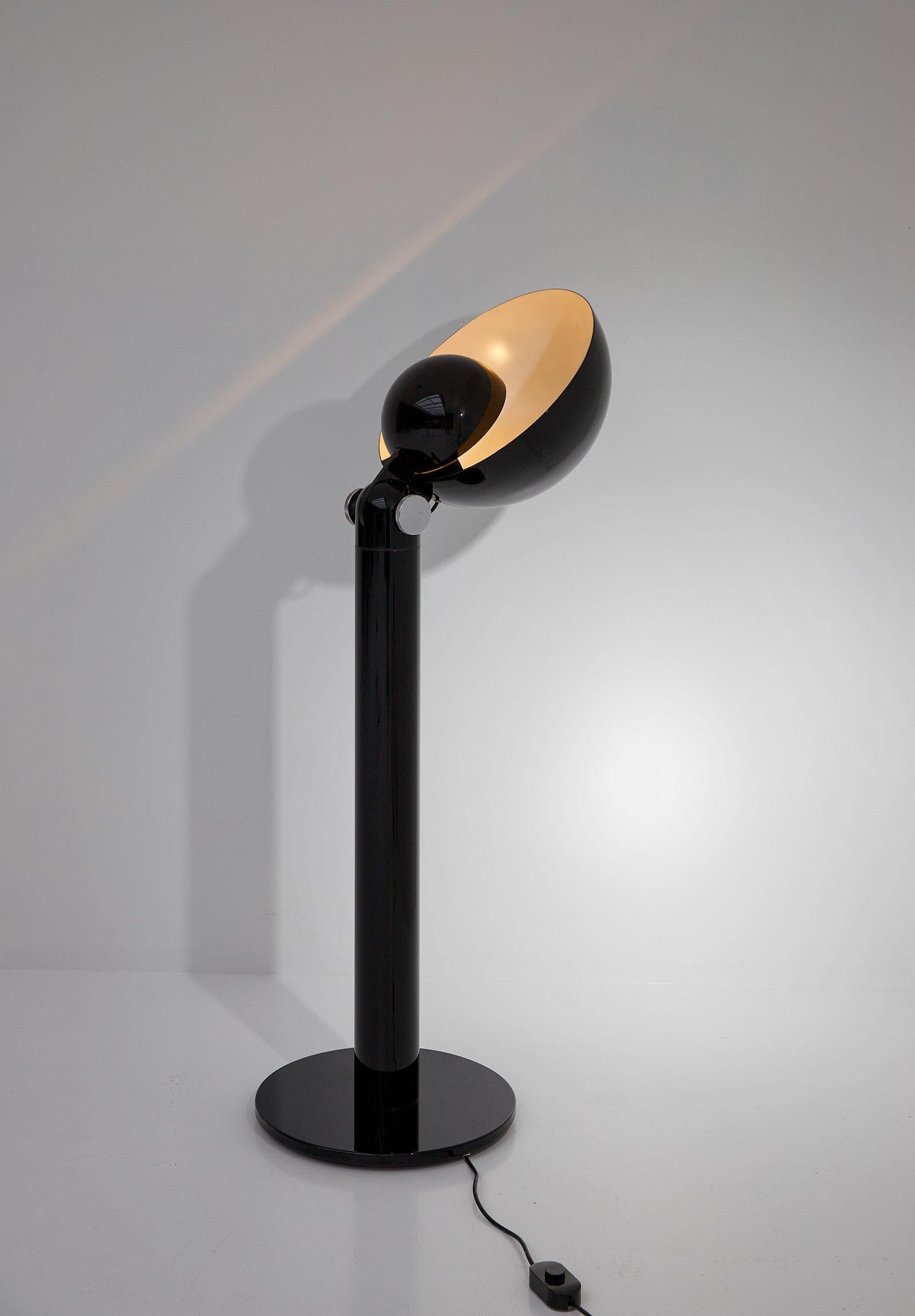 Cuffia floor lamp black edition designed by Francesco Buzzi for Bieffeplast in 1969. This postmodern lamp is made out of black lacquered aluminum with two adjustable shades who can turn 180 degrees. The use of the two shades gives the lamp a highly