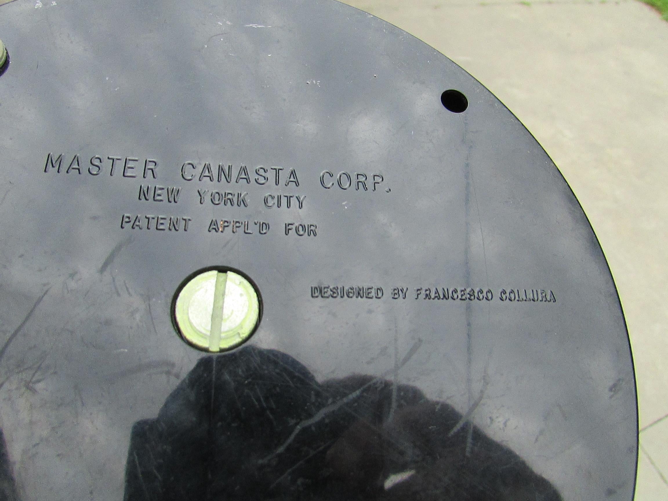 Poker chip , gaming chip dispenser . Master Canasta co. , New York , Patent Appl'd For , Designed by Francesco Collura cast into the body on the underside . Individual pods hold selection of chips color coded to the handle that dispense them .