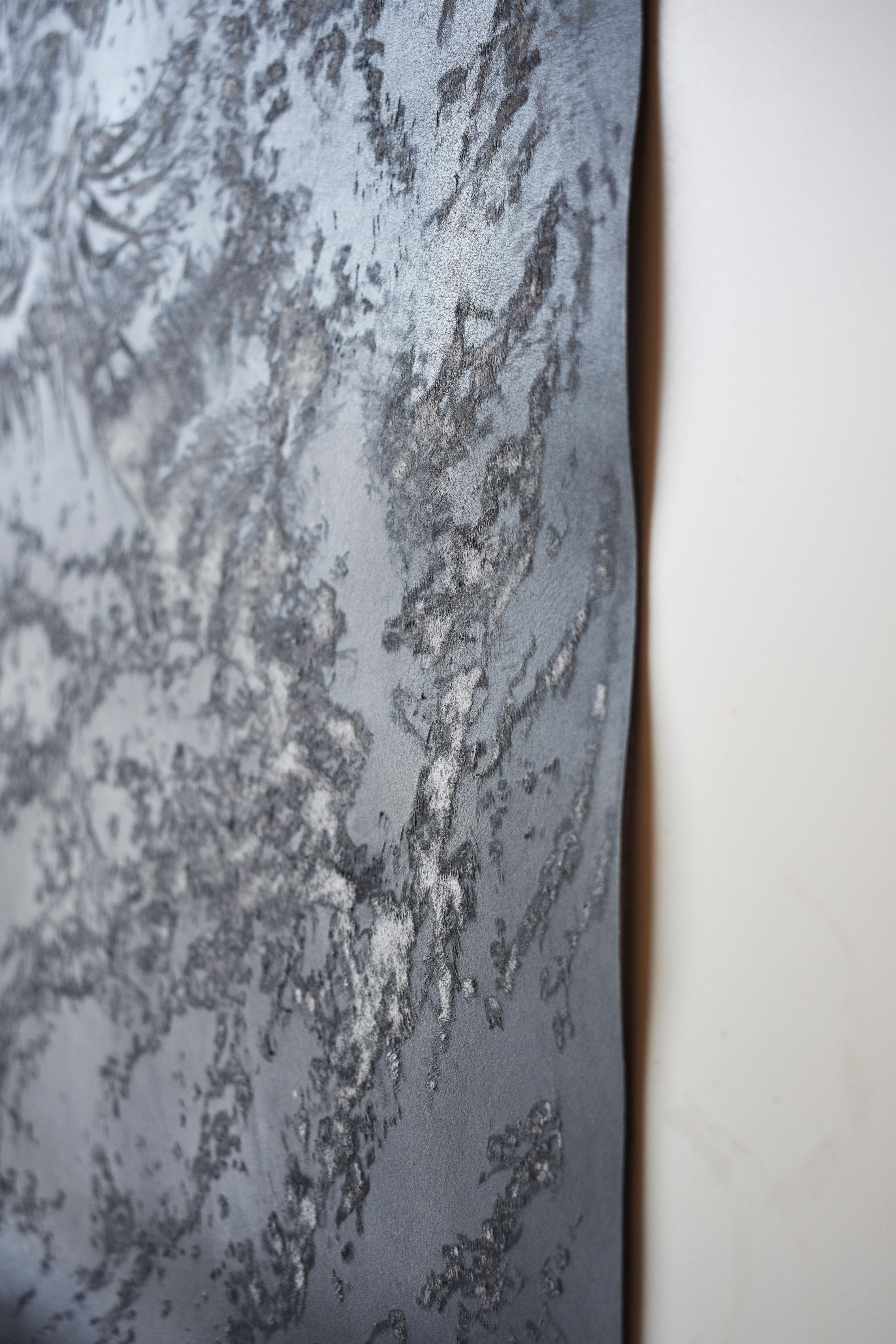 Drowned Roar is a commanding 21 x 27 inch original work by Italian artist Francesco La Rosa, whose mastery of microetching pushes the boundaries of contemporary realism. Rendered entirely on rich black leather, this one-of-a-kind piece captures the