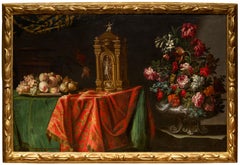 Silver vase with flowers, fruit tray and clock by Adeodato Zuccati
