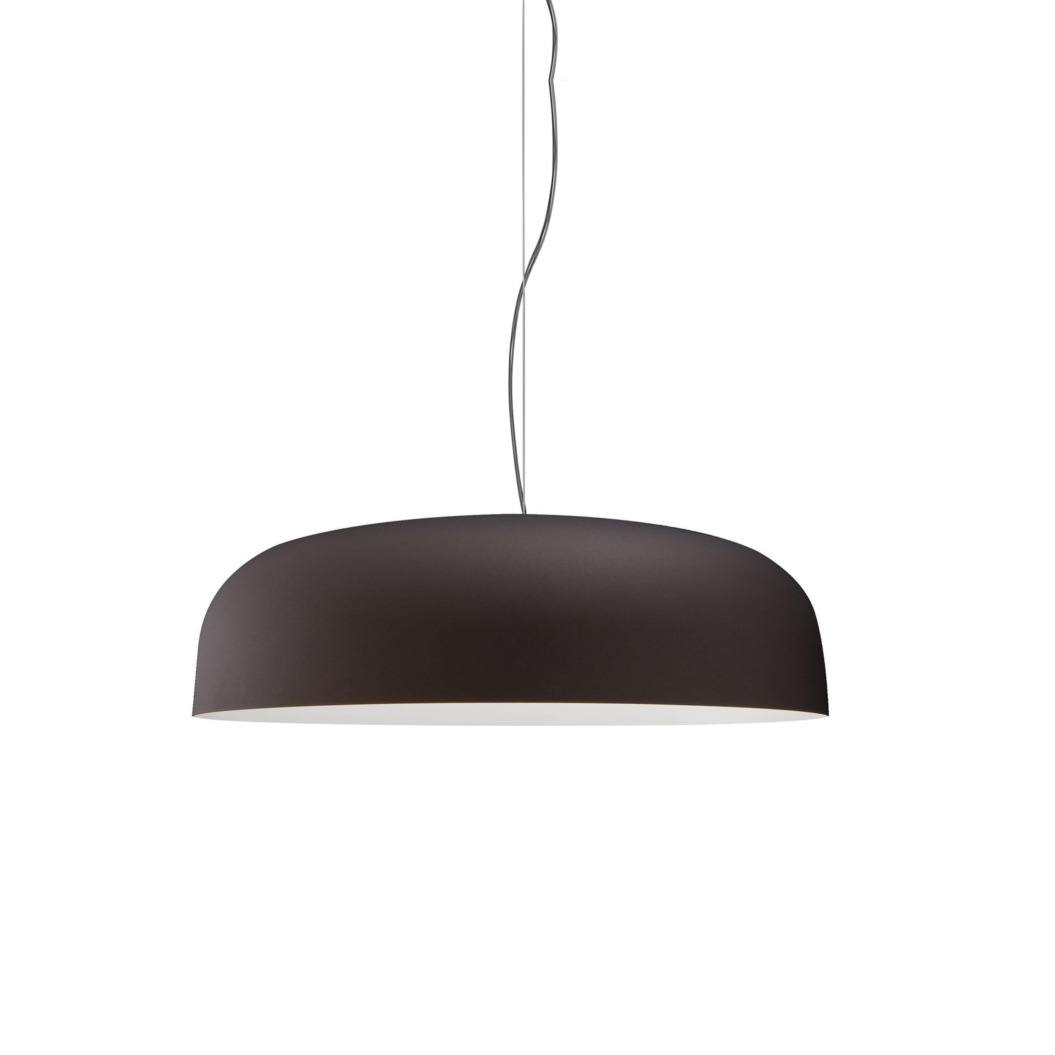 Suspension lamp 'Canopy' 421 designed by Francesco Rota in 2010.
Suspension lamp giving indirect fluorescent light. Reflector and lampshade screen in lacquered metal white, or two-colors. Manufactured by Oluce, Italy.

Canopy owes both its shape