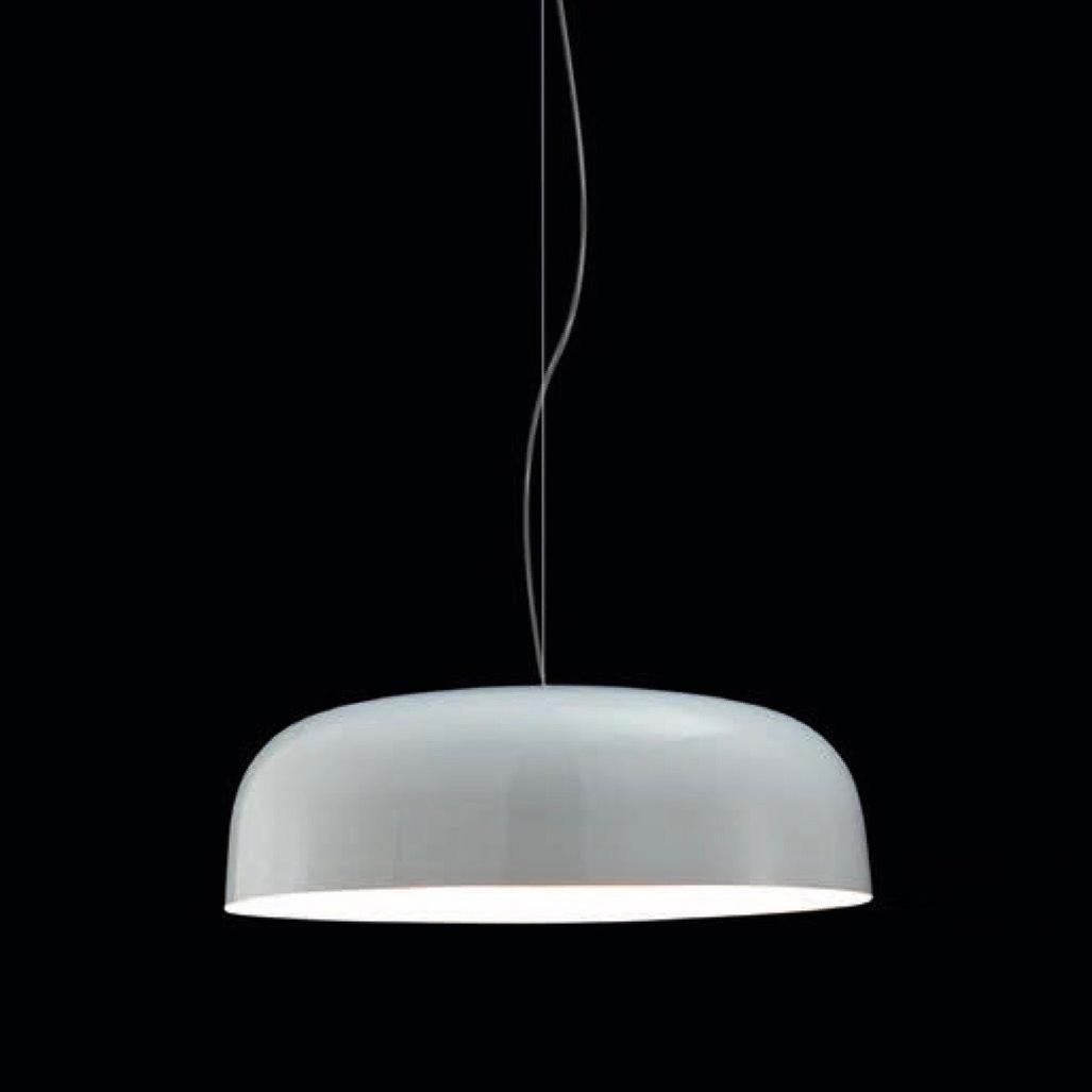 Suspension Lamp 'Canopy' 421 designed by Francesco Rota in 2010.
Suspension lamp giving indirect fluorescent light. Reflector and lampshade screen in lacquered metal white, or two-colors. Manufactured by Oluce, Italy.

Canopy owes both its shape and