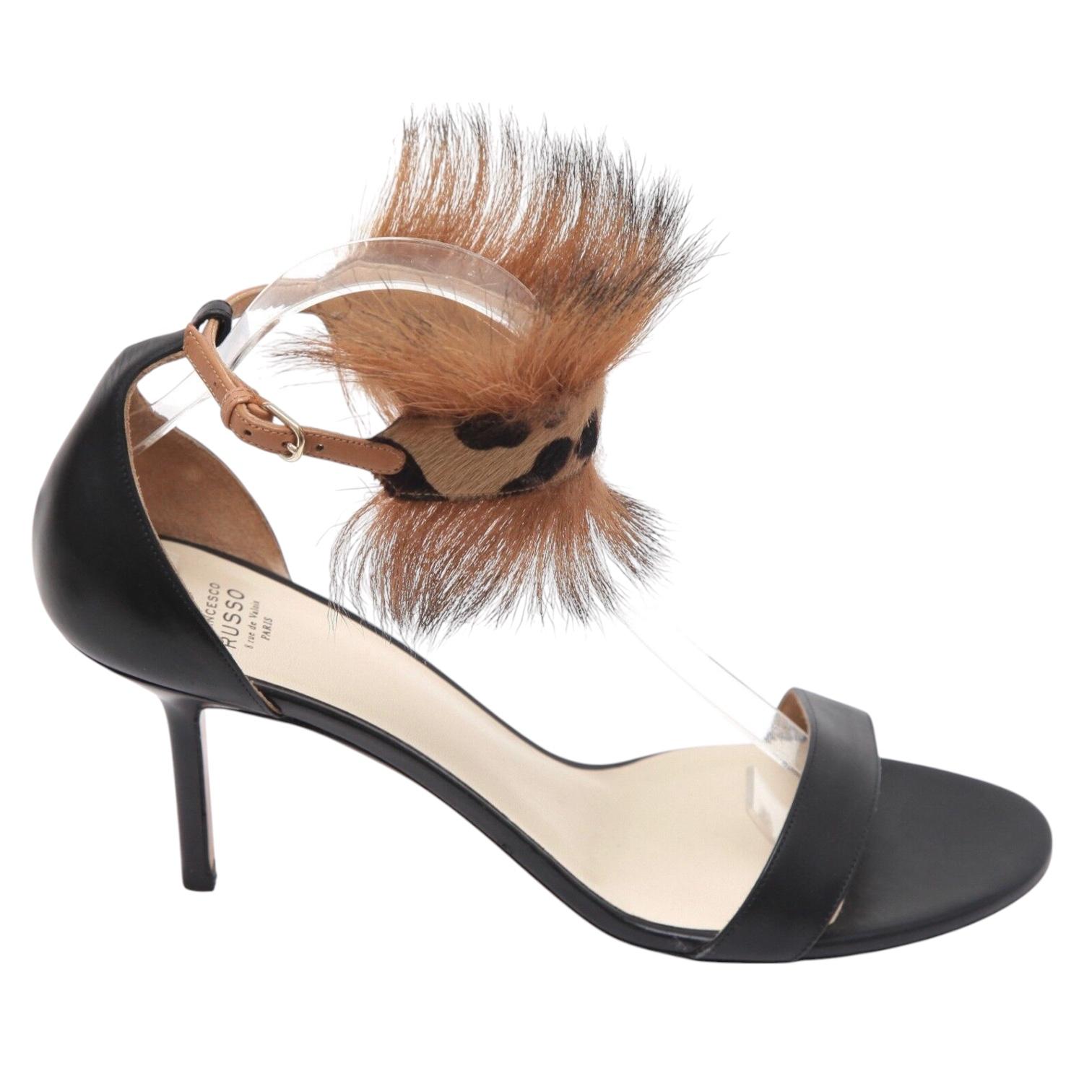 GUARANTEED AUTHENTIC FRANCESCO RUSSO BLACK LEATHER LEOPARD PRINT SANDALS

Retailed excluding sales taxes $1,165

Design:
- Black leather sandal with strap over vamp.
- Peep toe.
- Ankle strap designed with animal print calf hair and buckle.
-