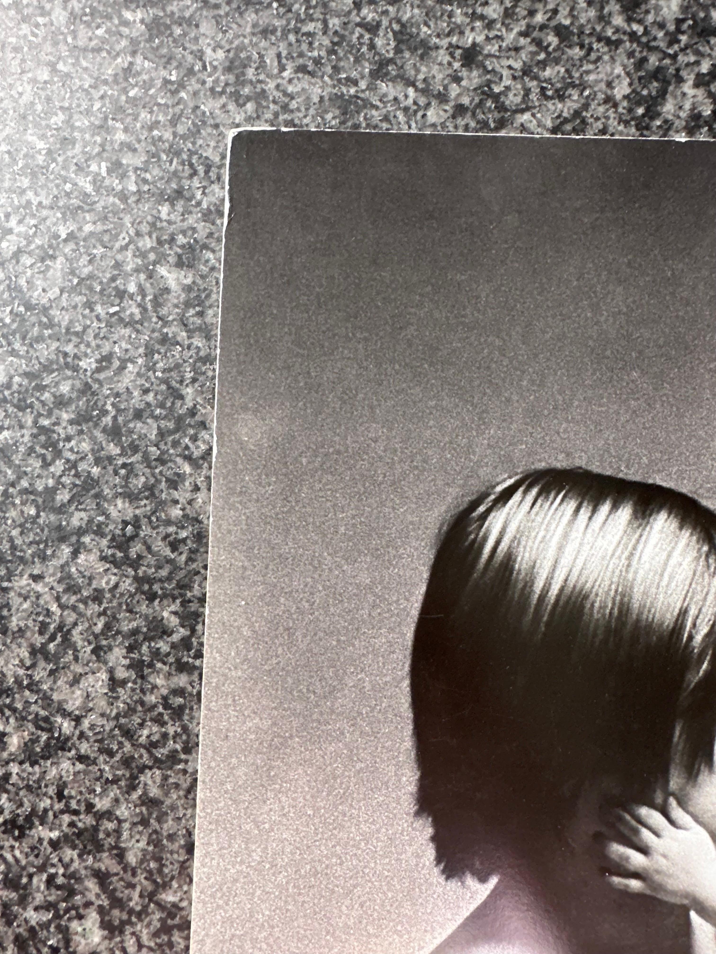 Francesco Scavullo, Andy Warhol's Flesh: Joe Dallesandro with Child I, 1968.  In Good Condition For Sale In Brooklyn, NY