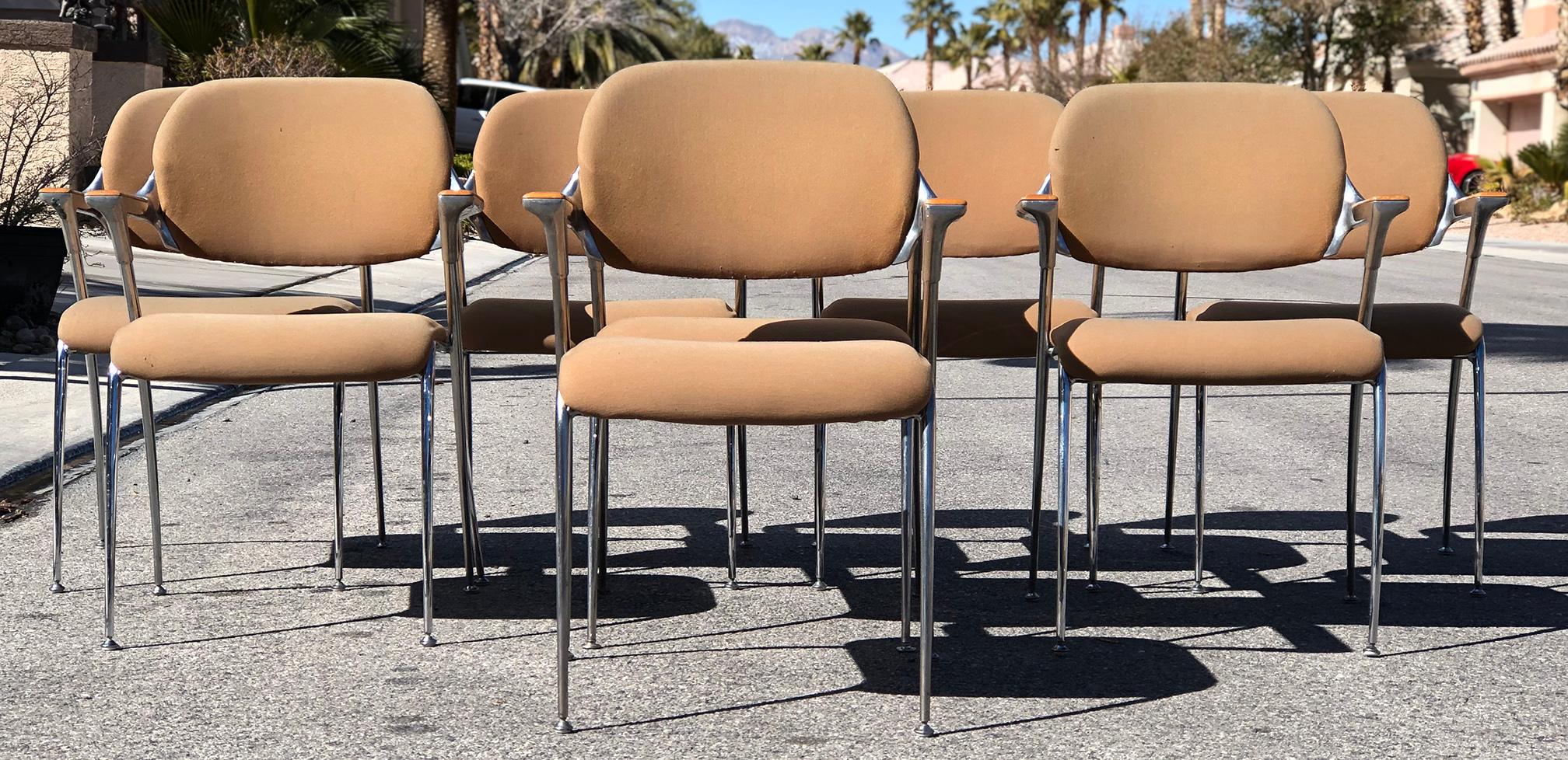 Very reminiscent of the style of Shelby William's Gazelle chairs, these Thonet chairs designed by Francesco Zaccone for Thonet in the 1970s are curvy, sleek and attractive from almost any angle. These chairs are upholstered in a tan cloth fabric.