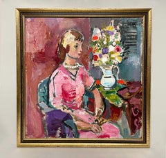 A Stylish Mid-Century Modern Portrait of a Seated Young Woman in a Pink Dress