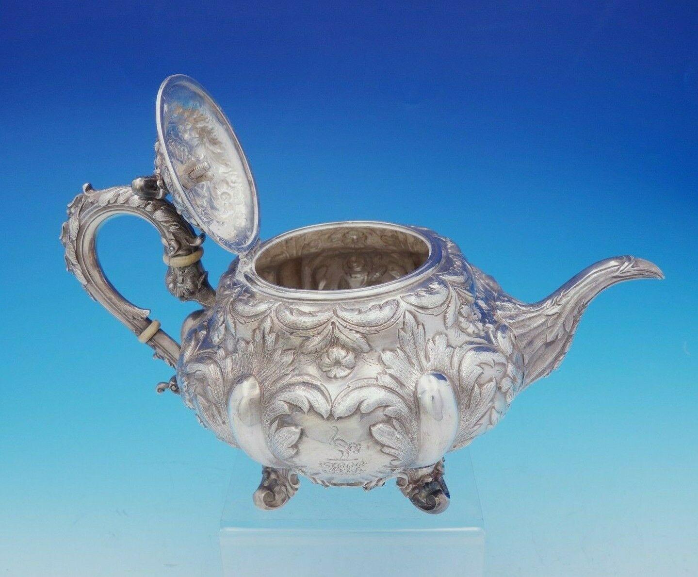 Francis David Dexter

Exceptional Francis David Dexter English Victorian sterling silver 3-piece tea set hand chased with intricate floral design. The tea pot has a 3-D cast leaf and acorn finial. The pieces have applied cast handles and cast