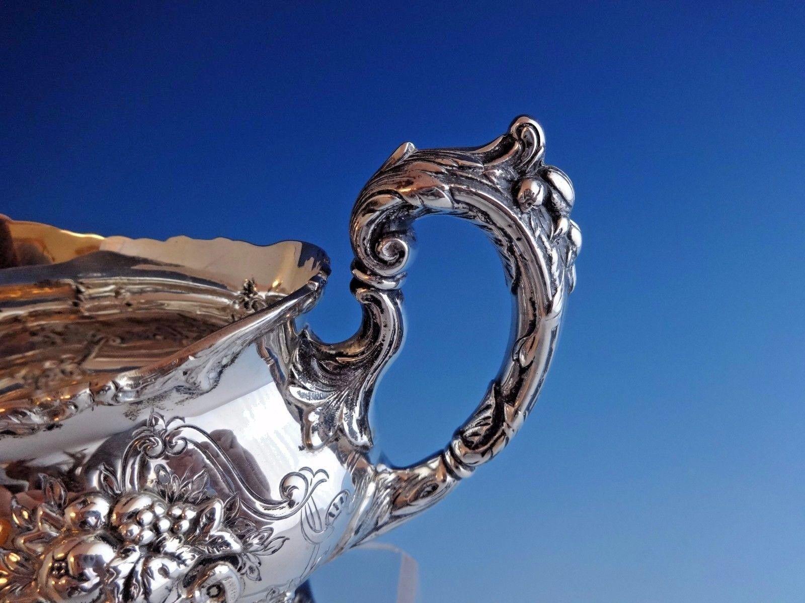 Francis I by Reed & Barton

Beautiful Francis I by Reed & Barton sterling silver gravy boat. This item is marked #570A and weighs 19.3 troy ounces. It measures 5 1/4 tall and 8 1/4 long. This piece is not monogrammed and is in excellent