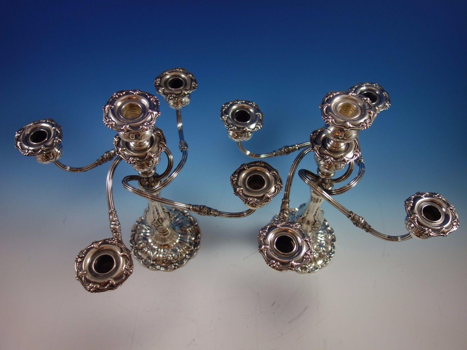Reed & Barton old sterling silver pair of 5-light candelabra 

Francis I by Reed & Barton

Stunning Francis I by Reed & Barton sterling silver pair of 5-light candelabras with candlestick base. They are marked with the number X5691 and measure
