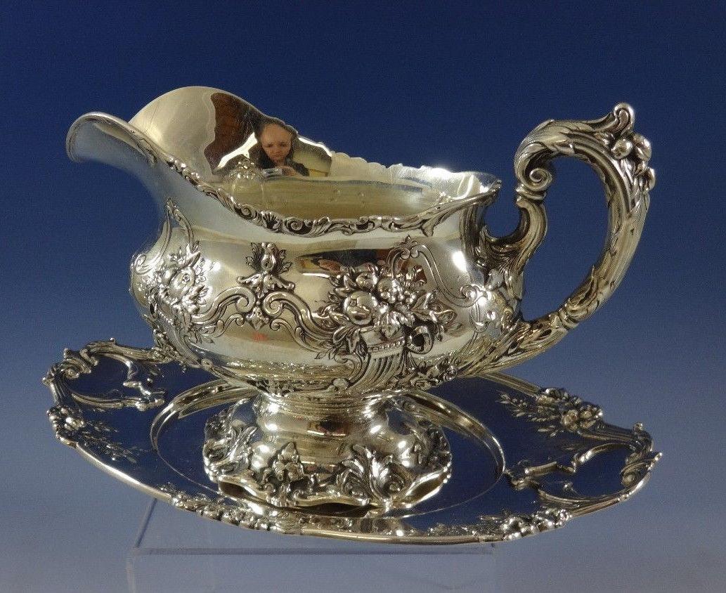 Superb sterling silver gravy boat 8 1/4 L X 4 W X 5 H, weighing 18.5 troy ounces with underplate 10 L X 5 3/4 W, weighing 8.2 troy ounces in the pattern Francis I By Reed & Barton. It is not monogrammed and is in excellent condition. Fabulous