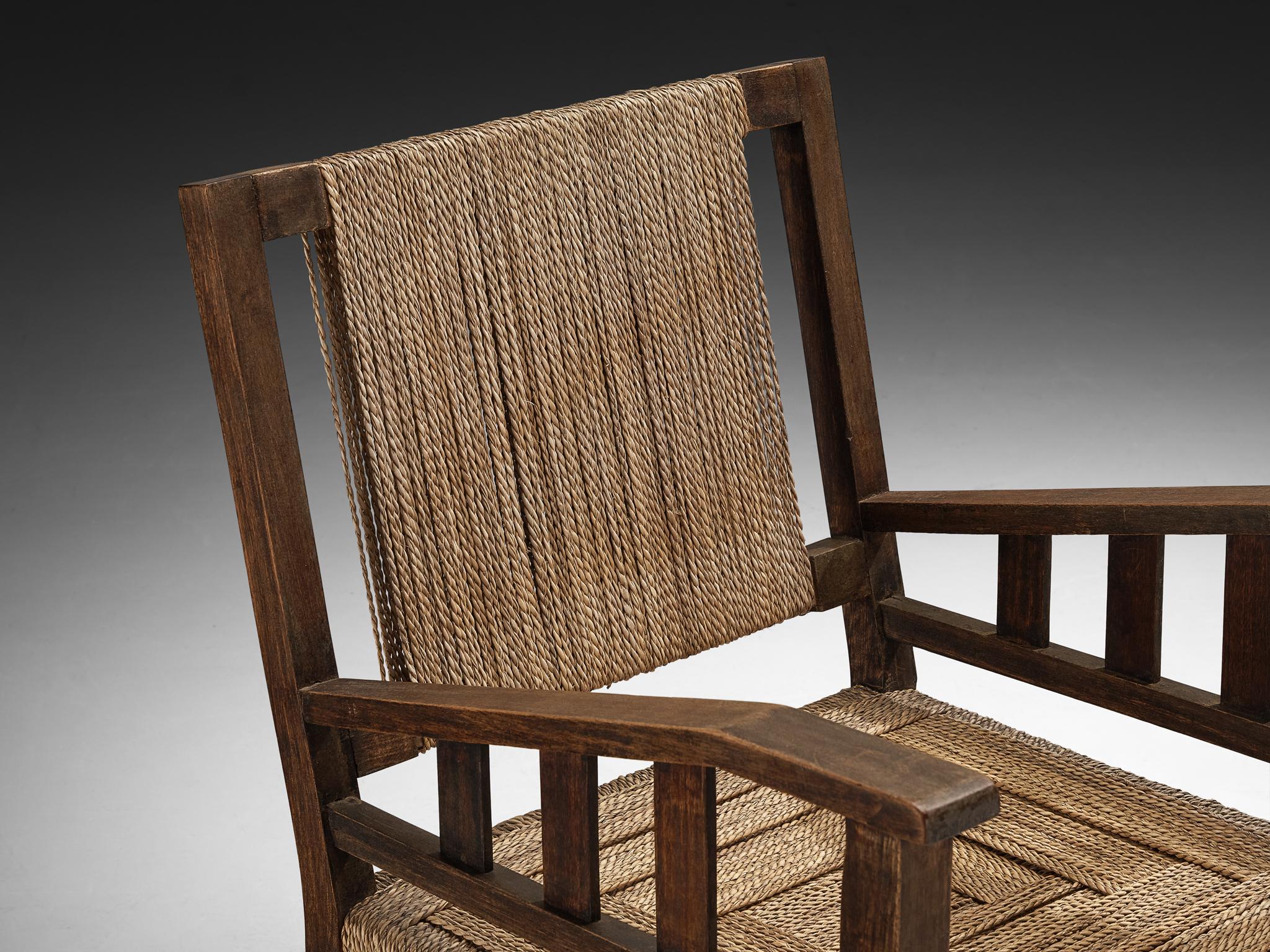 Early 20th Century Francis Jourdain Lounge Chair in Woven Straw and Wood For Sale