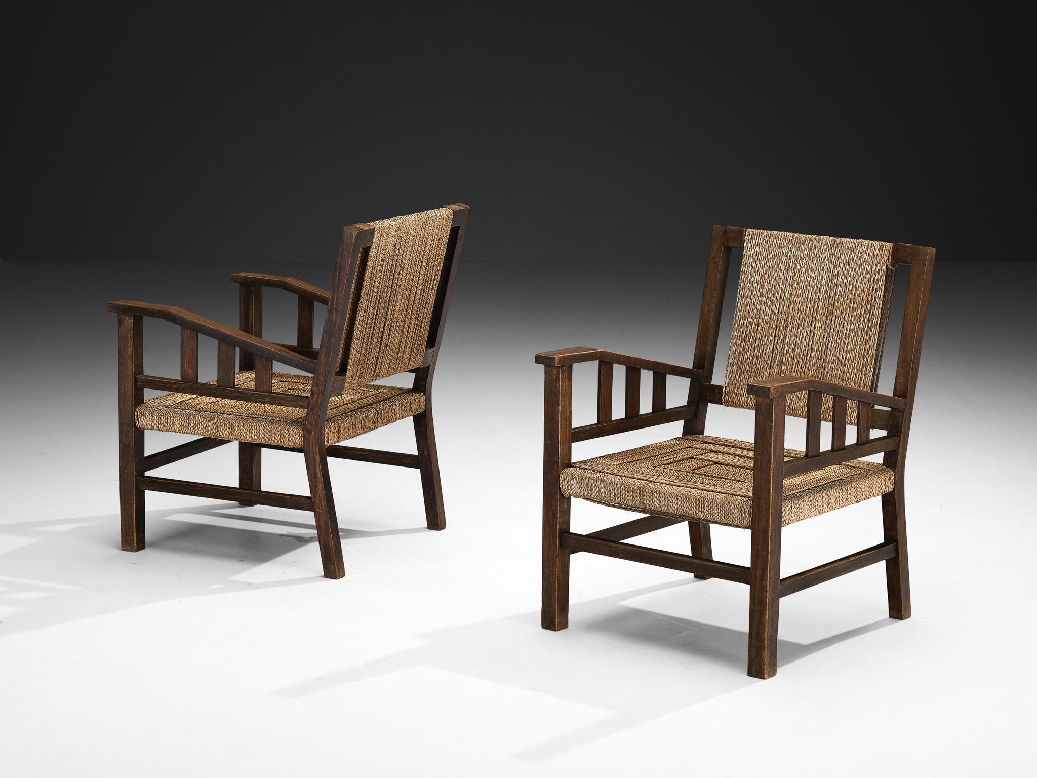 Francis Jourdain, paire de fauteuils, paille, bois teinté, France, 1925

Cette chaise exceptionnelle est une création du peintre et ébéniste français Francis Jourdain (1976-1958) et dégage un charme provincial raffiné, incarnant une élégance exquise